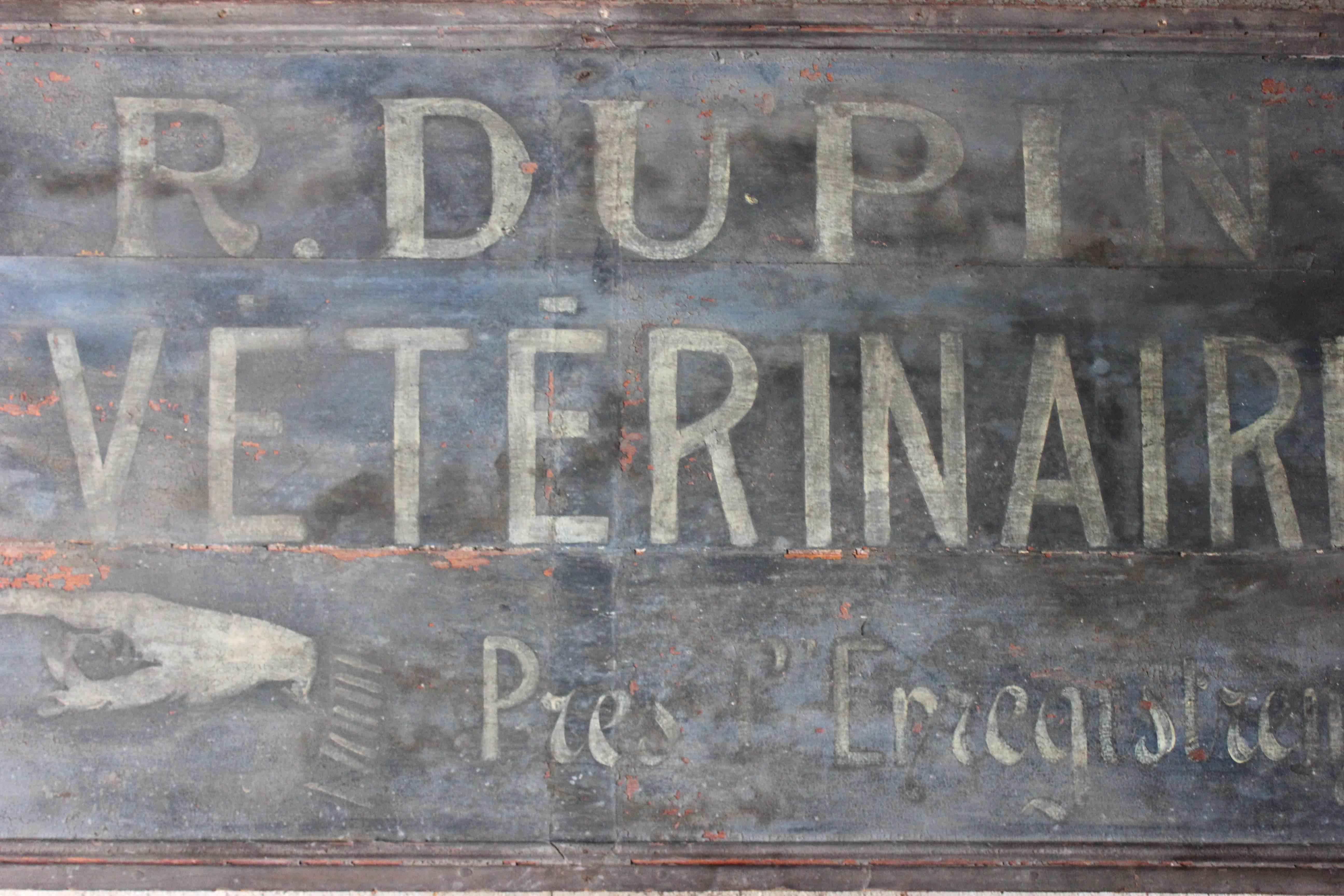 The French period painted pine veterinary trade sign of good size consisting of three adjoined panels sign written ‘R. Dupin Veterinaire Pres (L?)‘Enregistrement’ for R.Dupin Registered Veterinarian, in bold ivory script over a stunning indigo blue