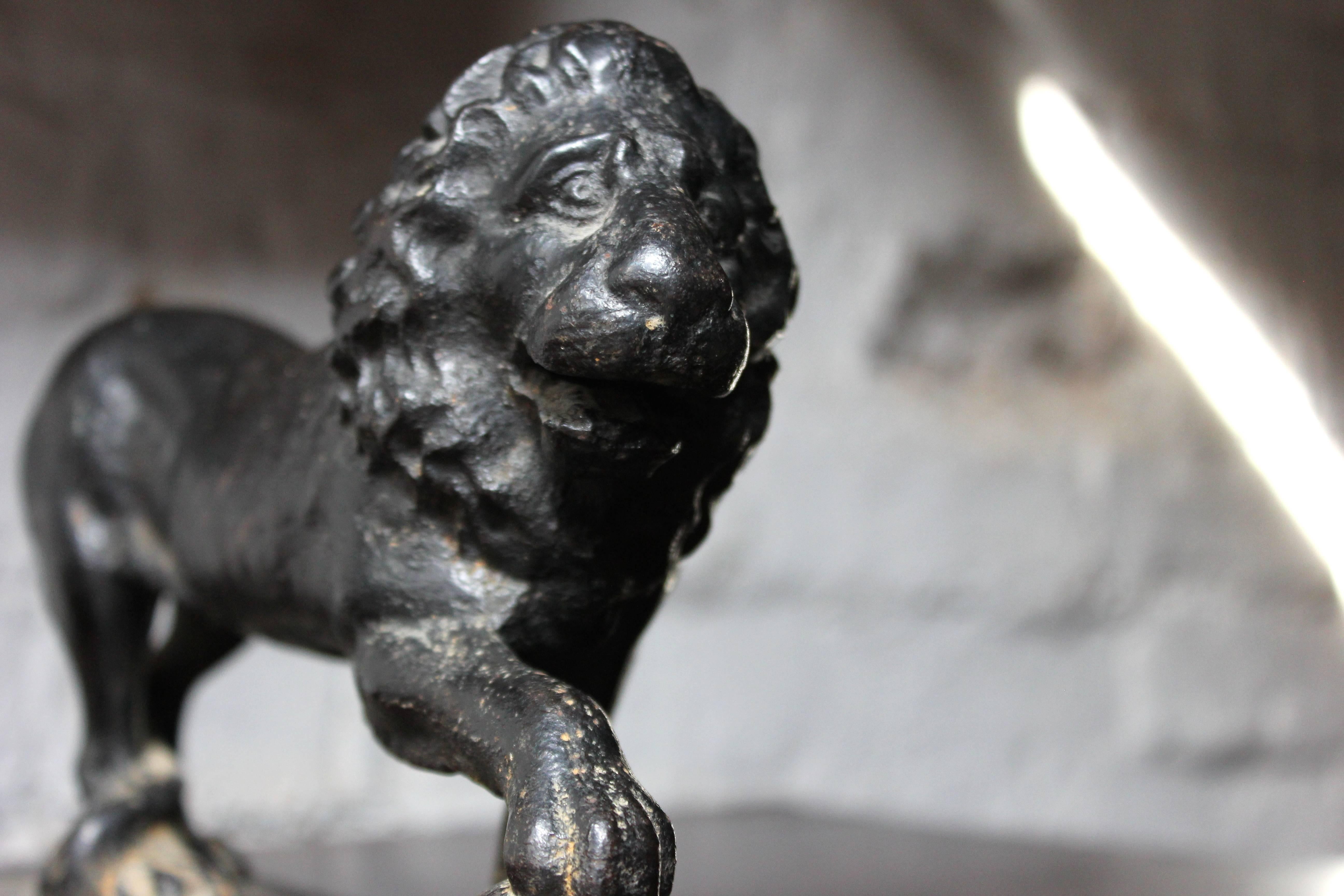 Early 19th Century Regency Cast Iron Door Porter in the Form of the Medici Lion, circa 1820-1830