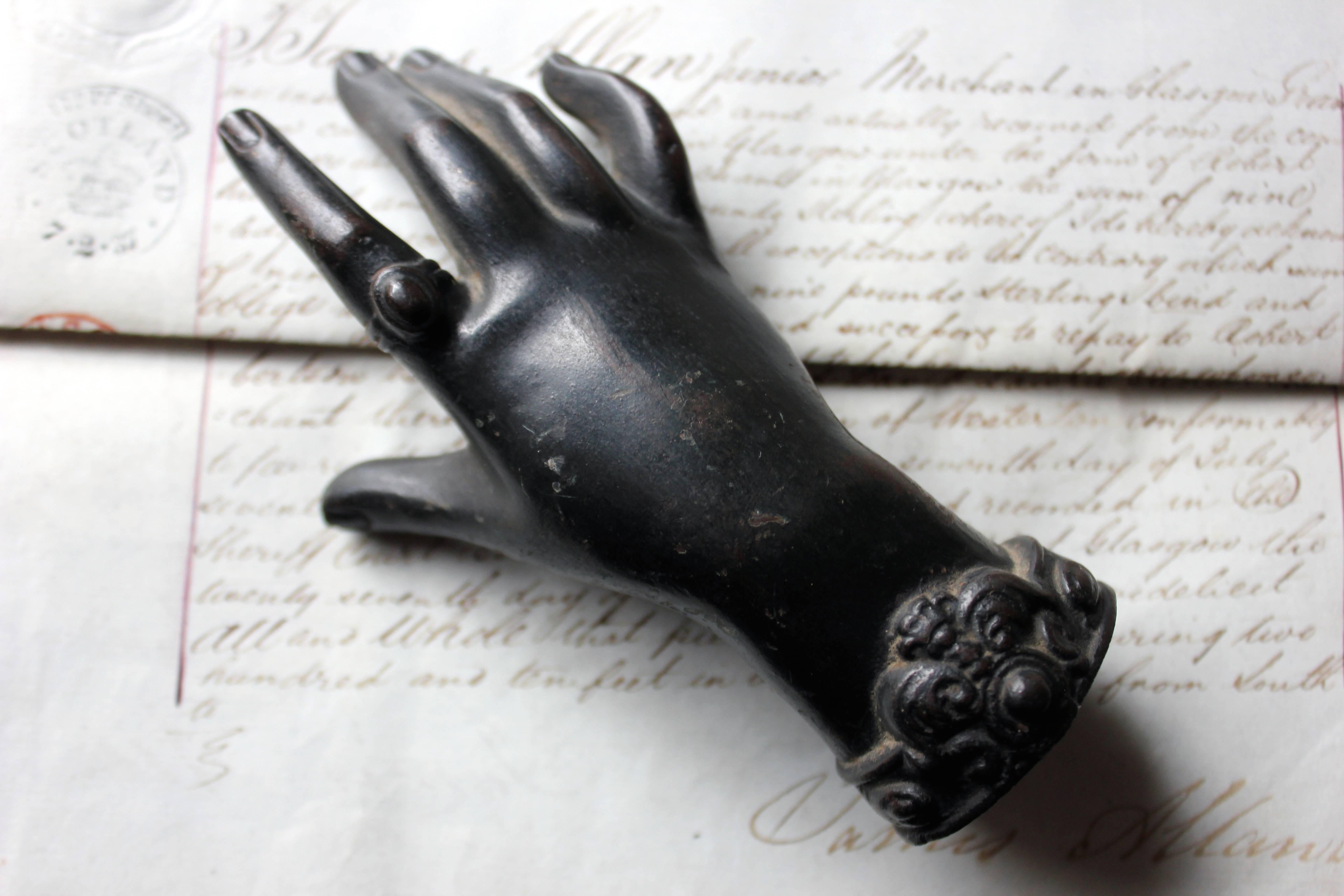Victorian Dark Patinated Cast Iron Paperweight in the Form of a Ladies Hand 1