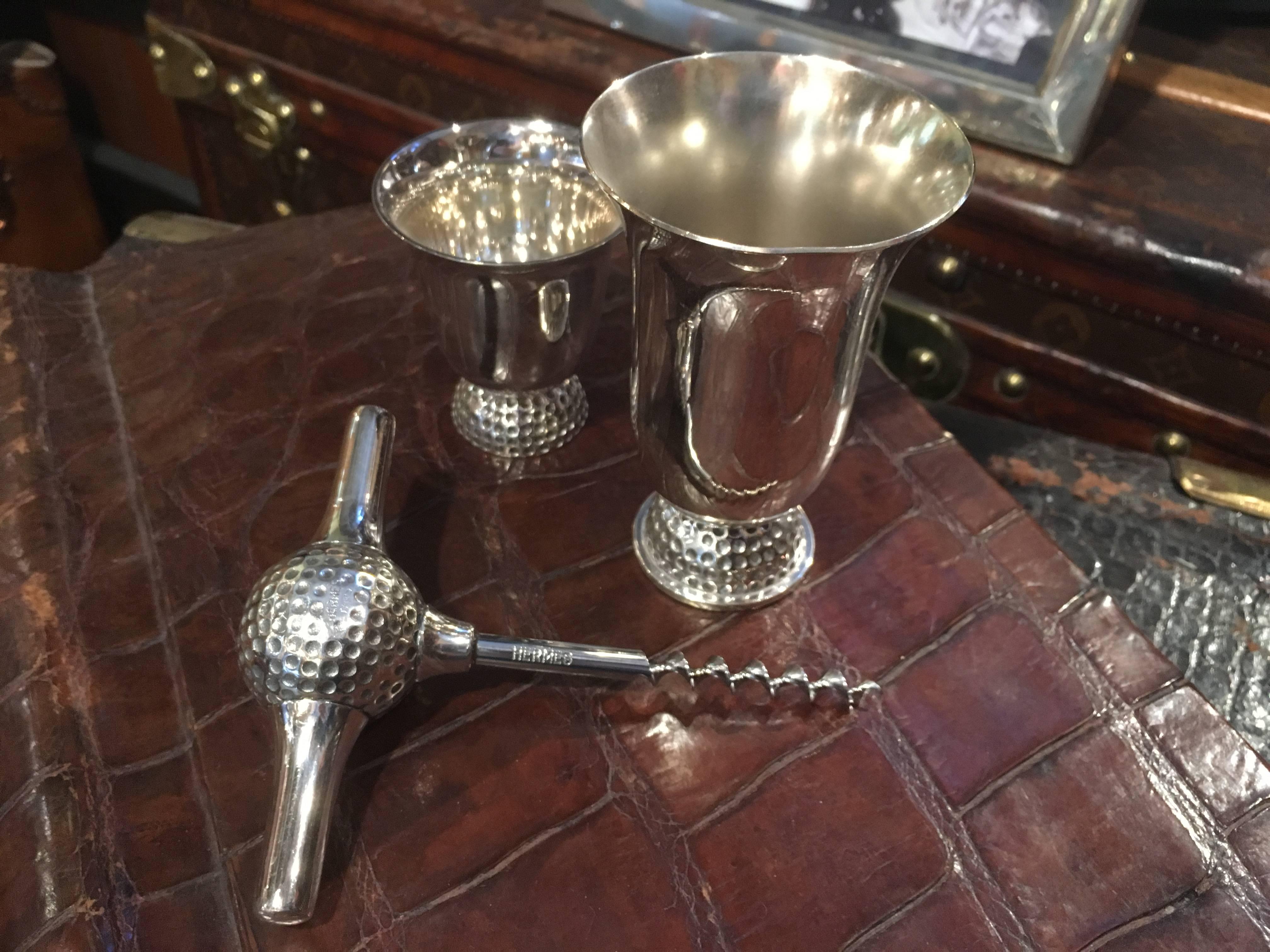 A rare Hermes Golf themes bar set comprising corkscrew and two tasting goblets.

Now discontinued, the Golf themed barware from Hermes is particularly sought after. 

In pristine, unused condition.
