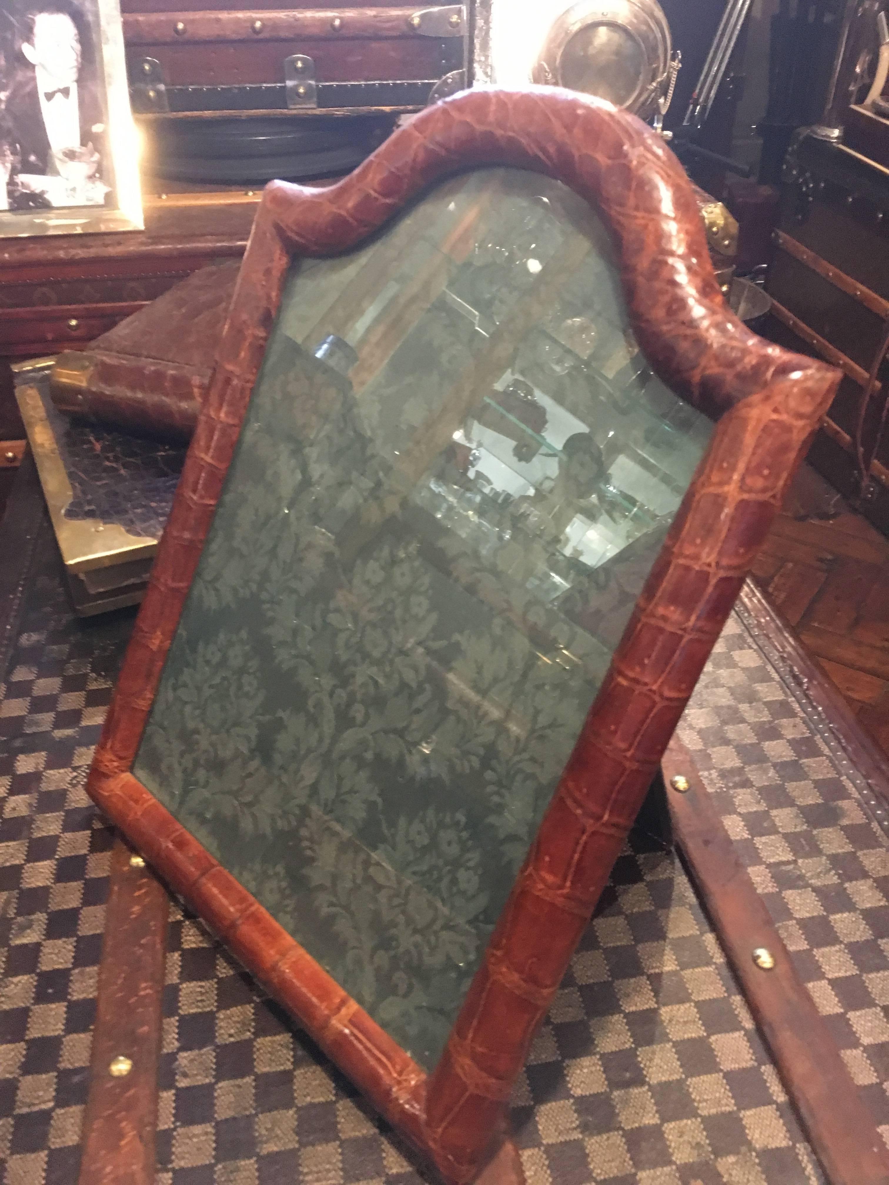 A very large and unusual, dome topped, crocodile skin photograph frame by Asprey & Co of London, circa 1910.

Standing just a tad under 16 inches high and a tad over 11 inches wide. The crocodile skin in fantastic condition. 

With original back