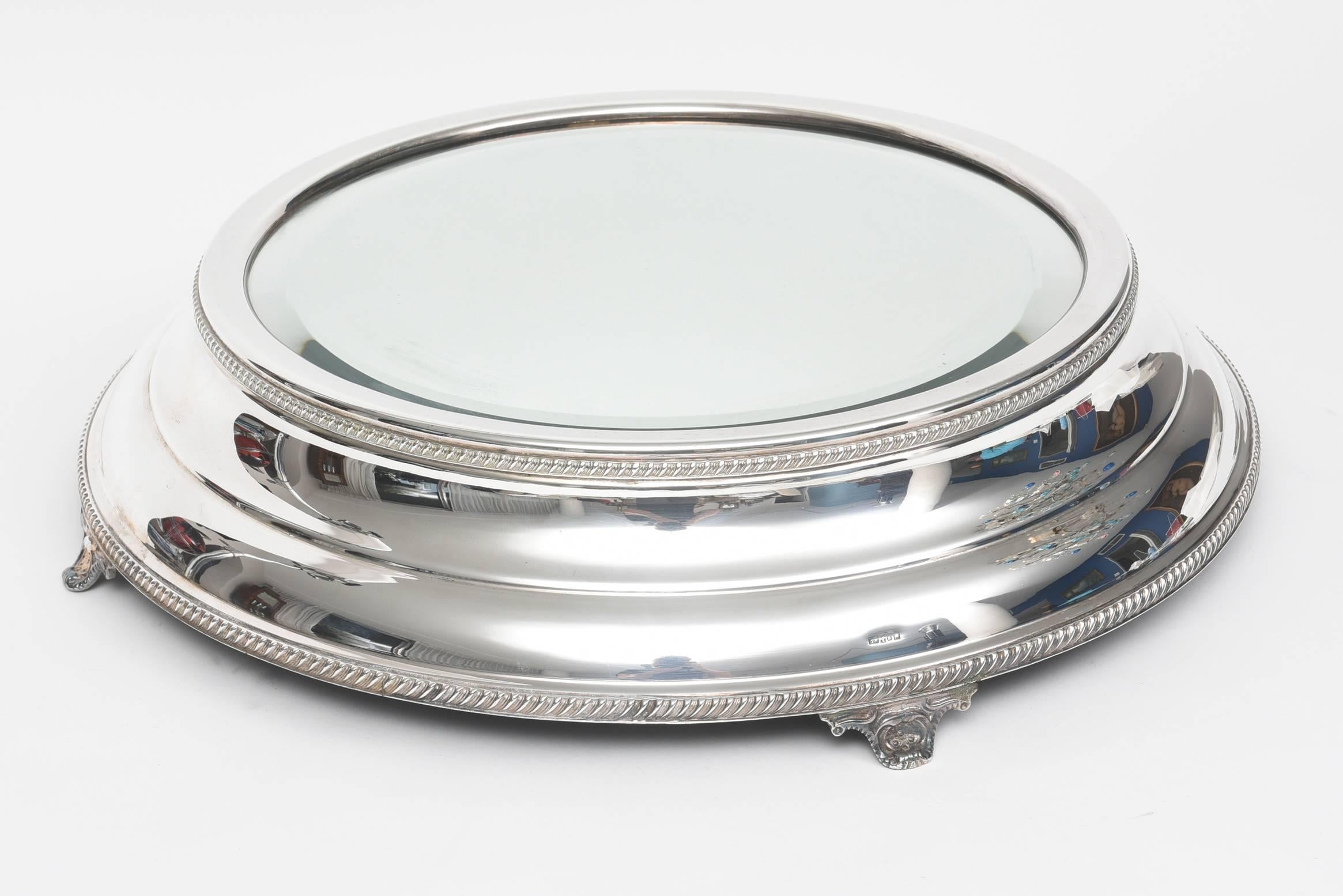 Silver plate wedding cake stand or plateau. Detailed with tapered design, beaded edges, beveled mirror, and footed base. Solid wood base. European hallmarks. Cake area, 13.5