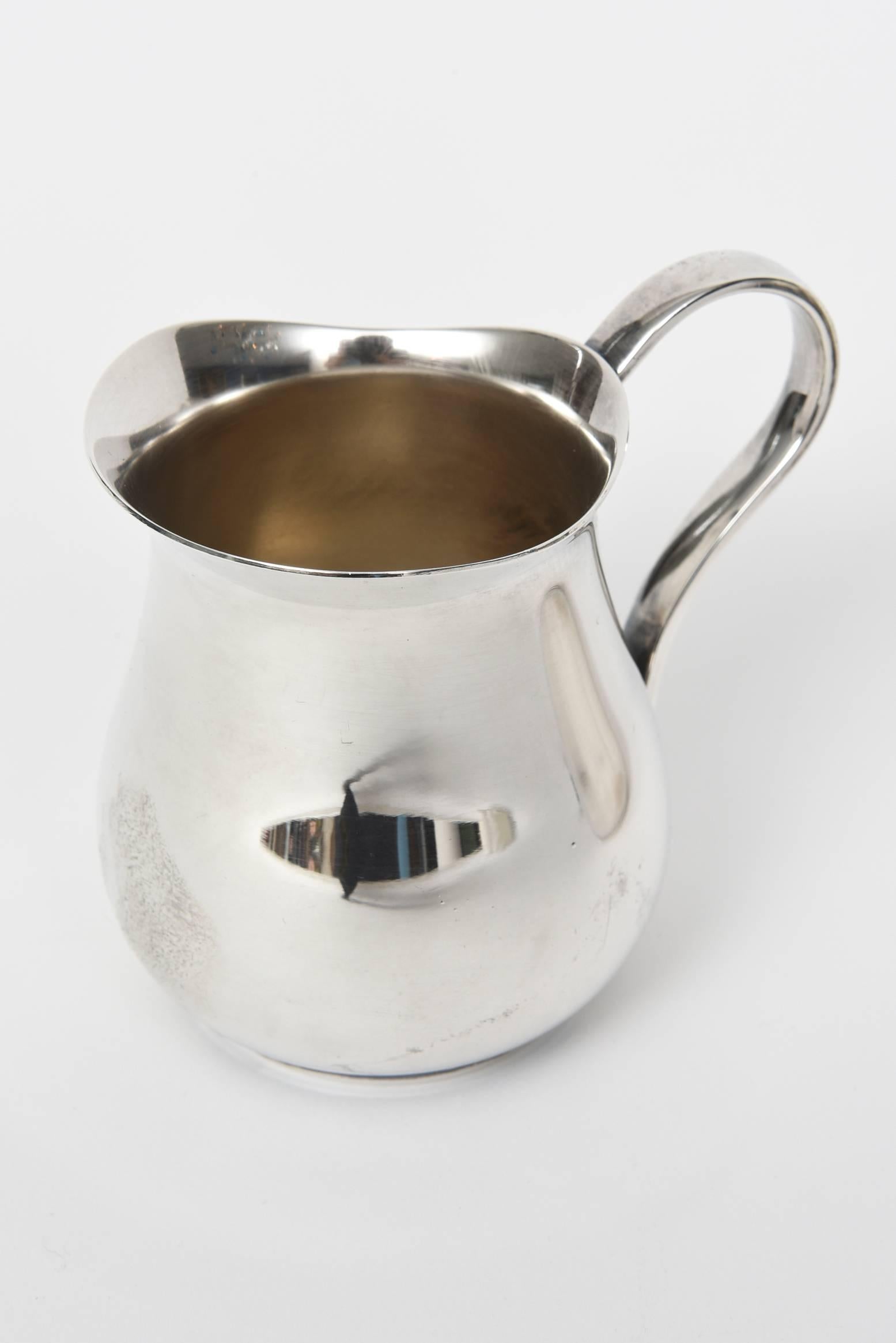 Christofle silver plated sugar bowl with lid and creamer in the Albi pattern,
Sugar bowl is 4.5