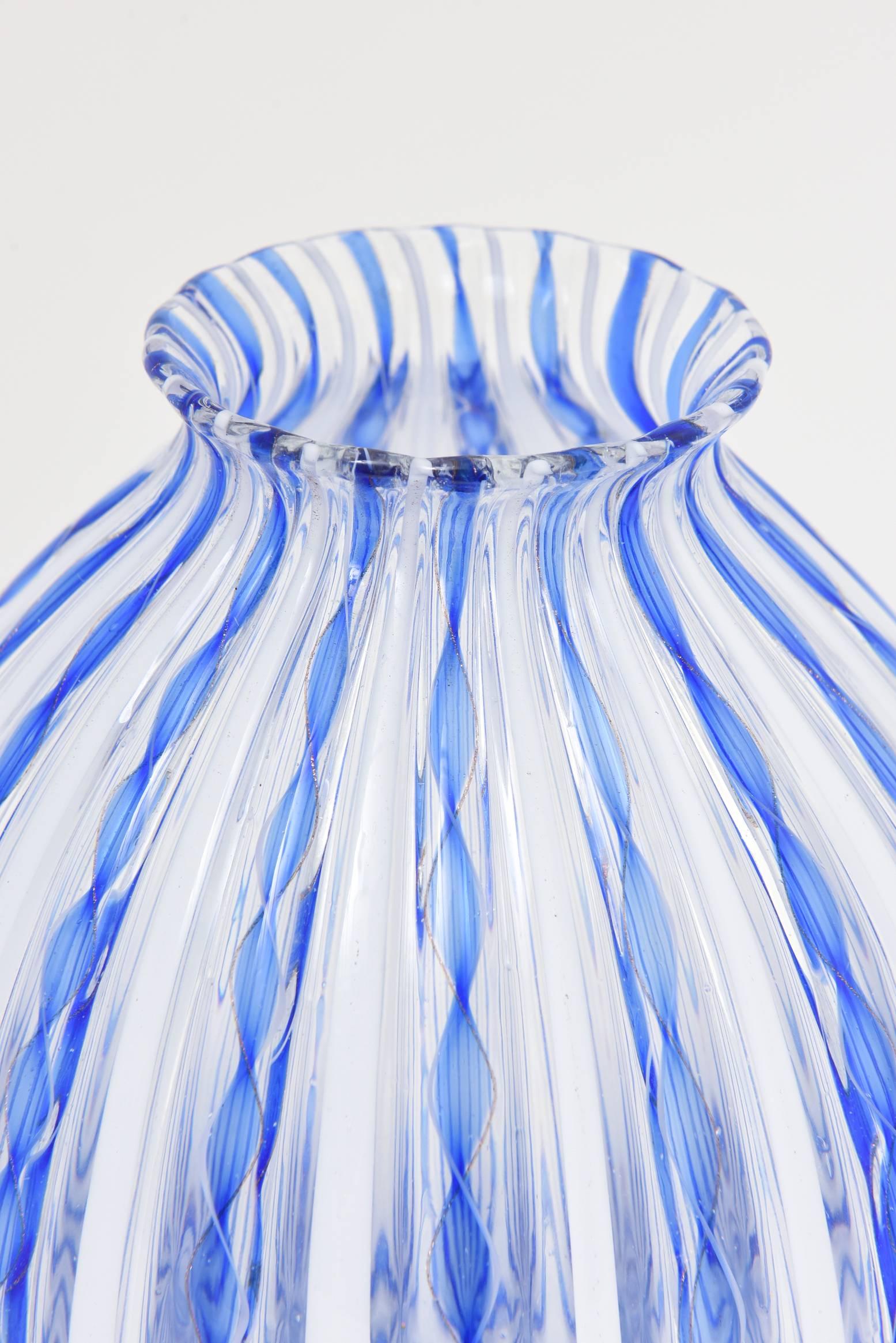 Mid-20th century, Murano art glass clear vase with blue twisted ribbon and solid white stripes.
