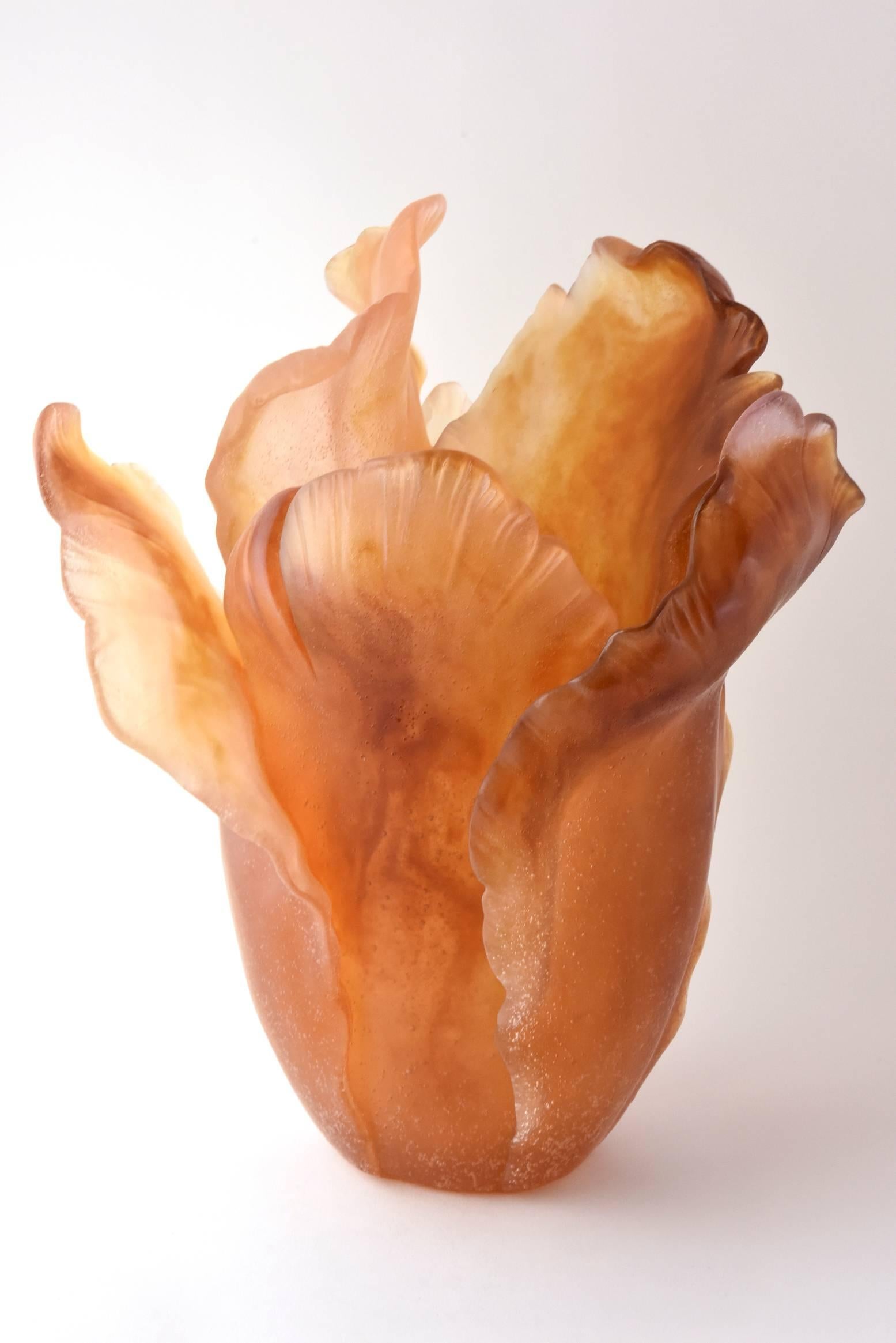 This impressive Daum Amber Tulip Vase was purchased at Neiman Marcus. It was handcrafted in France. 

They are sold out at Neimans, but the current retail price is $4,450..

About Daum:
In 1878, Jean Daum set up a workshop in the Lorrain region of