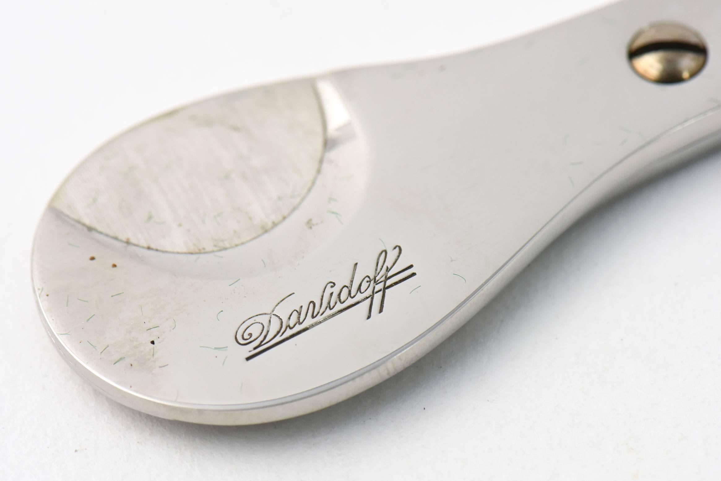 Davidoff Cigar Scissors are a first-class method of cutting the finest cigars. Hand-forged of stainless steel and assembled by hand in France, they guarantee a large, direct circular cut to allow the perfect amount of smoke through.
Retail $470.