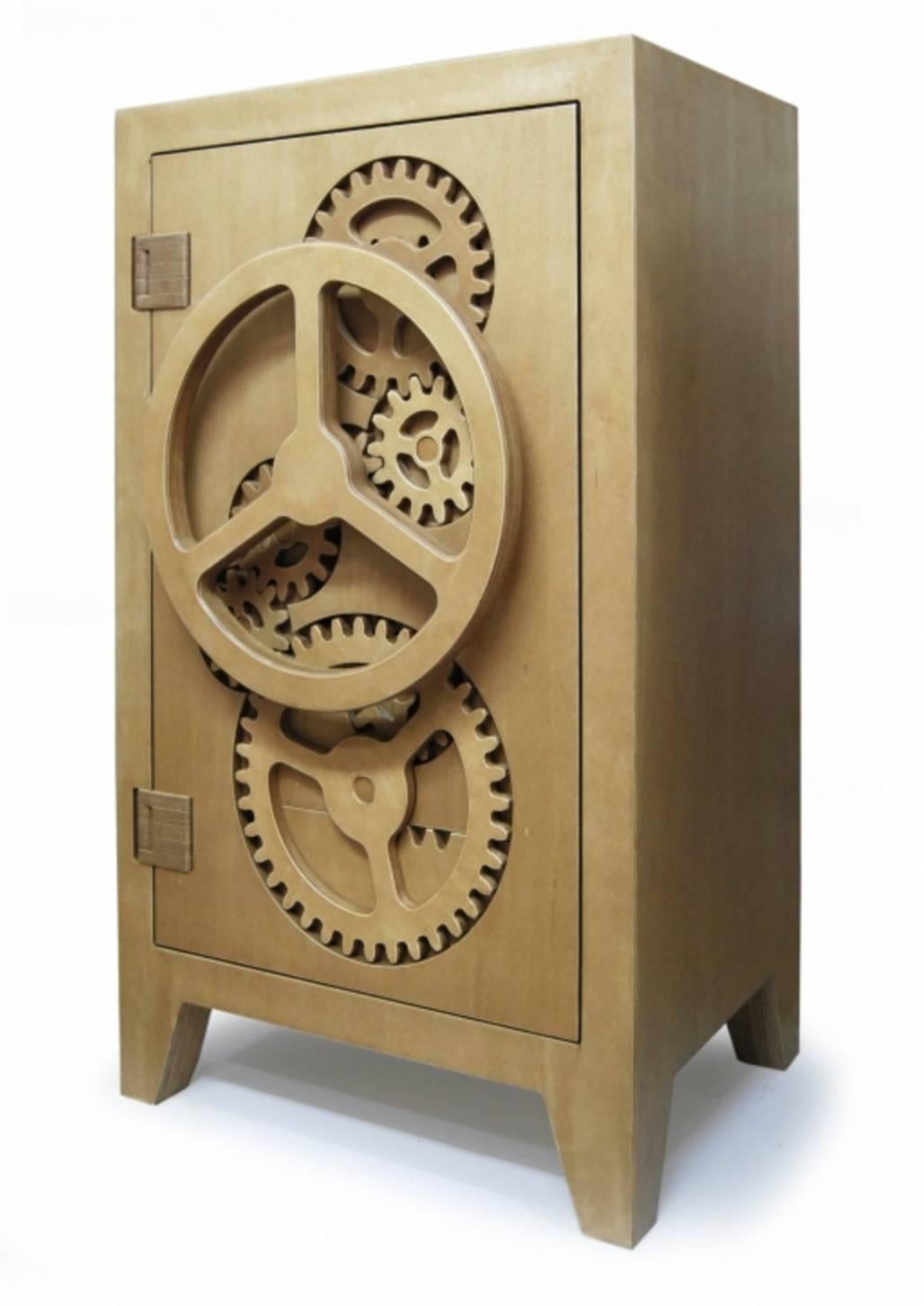 Mr. Knox is a funny translation of a heavy steel safe box into a smart and playful wooden piece of furniture.

The cnc cut gears fit perfectly together which enables the closing system to work exact as its steel example.

The cabinet is 99,9%