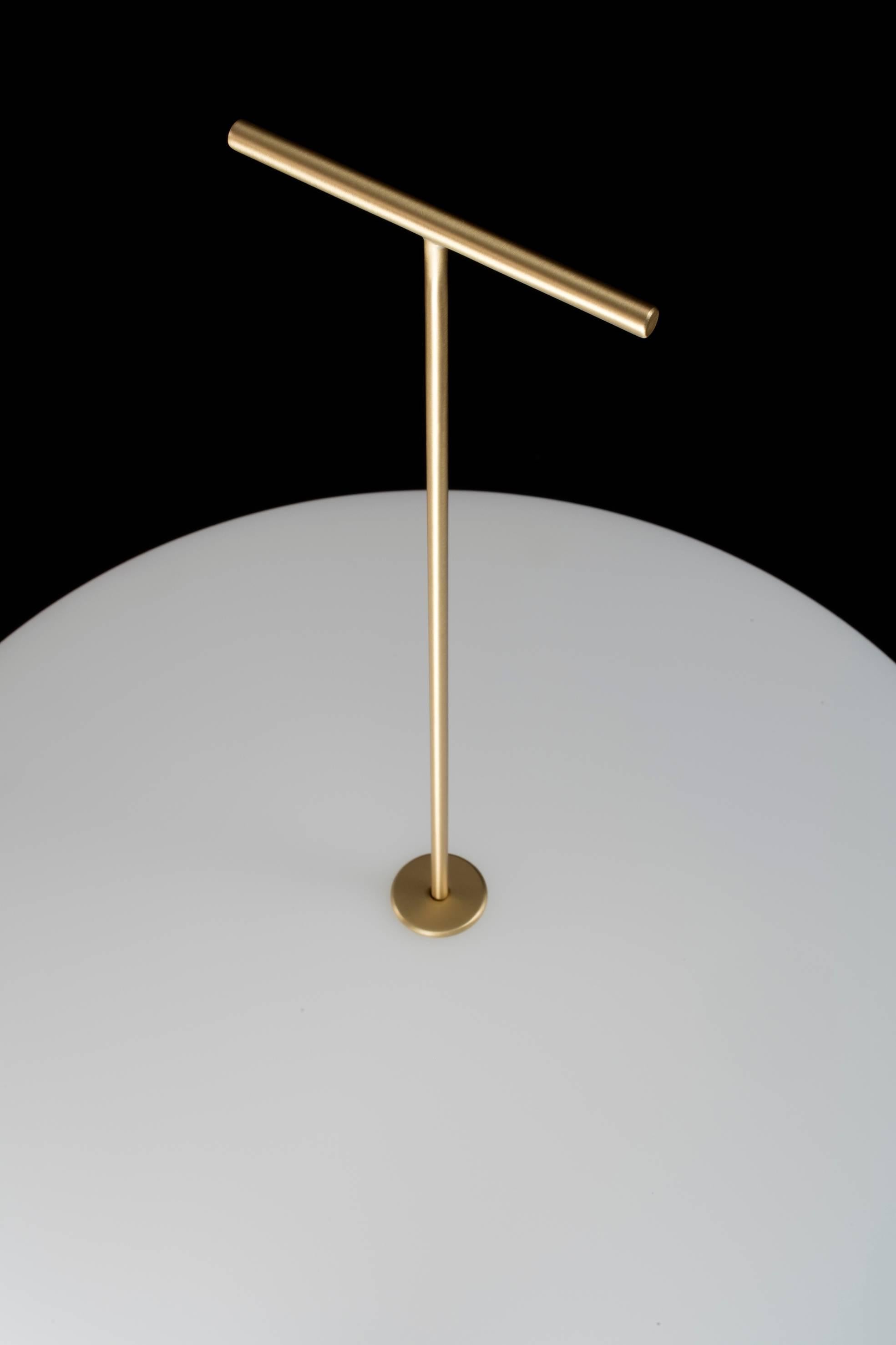 The Luna Lamp is a piece that has never been put in production until now. 

It has previously been exhibited on one occasion at the Milan Triennale in 1957, but never made available to the public. 

It is a floor-standing lamp with a thin brushed