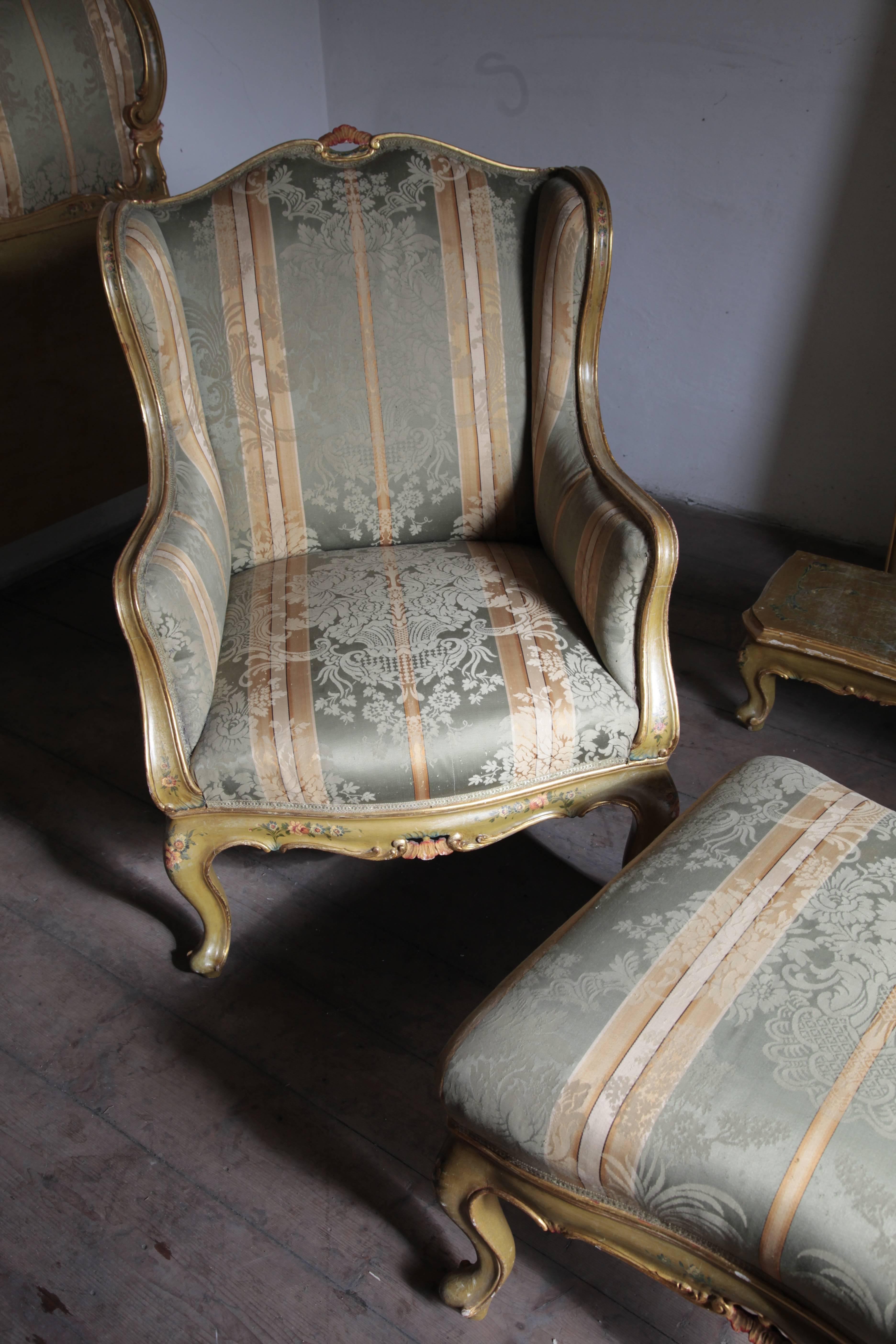 Here is an original Venetian armchairs and one footrest.
Both pieces are hand-painted. 

These are original pieces from the 1920s, recalling the Venetian furniture style of the 18th and 19th centuries. Visually, the Venetian-style furniture are