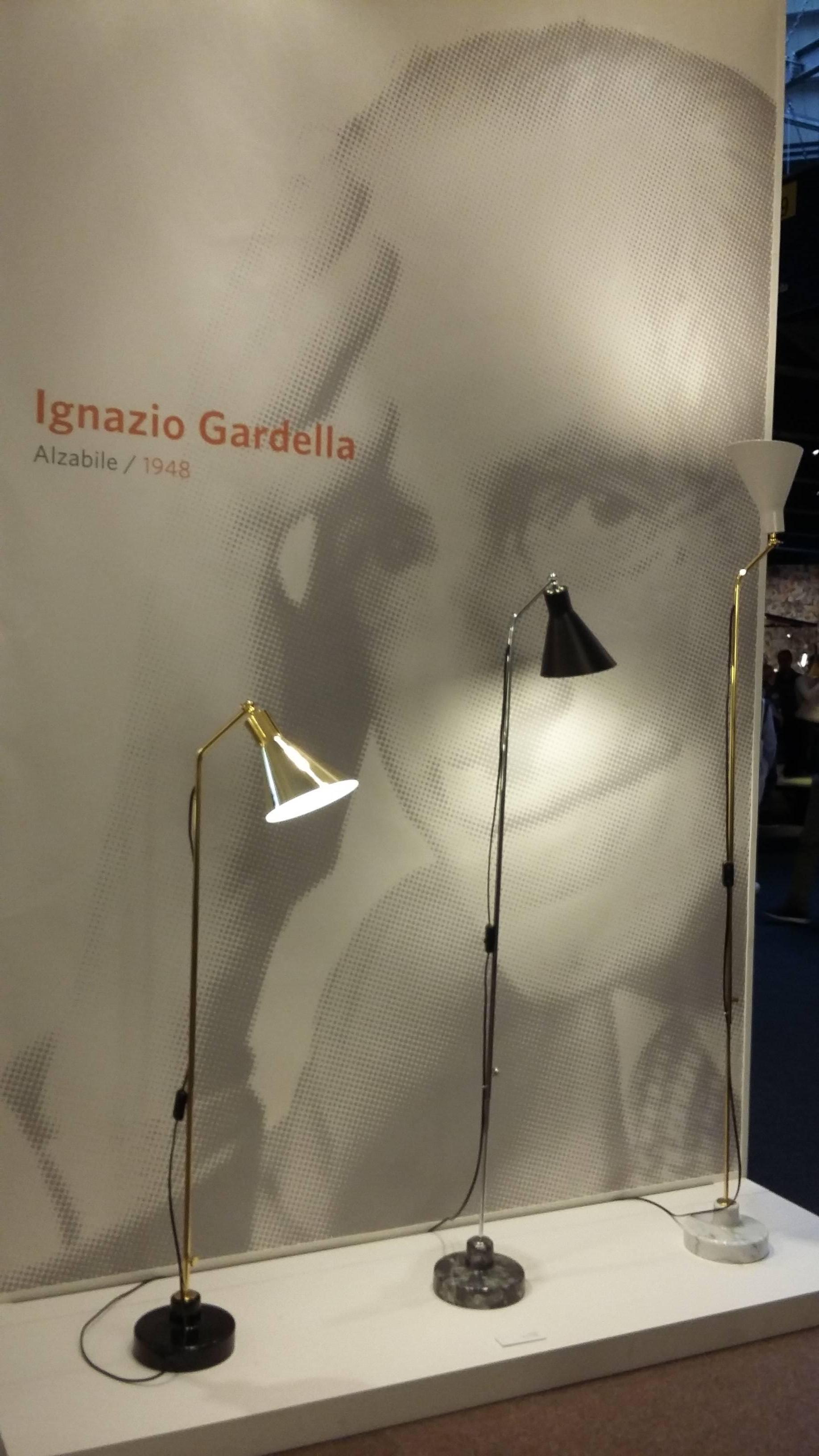 Re-edition of beautiful lamp by Gardella from 1948 by Tato Italia. 

This lamp's can be regulated between 216cm to its highest point, to its minimum of 125 cm. 

You can choose between three marble bases: Carrara, marquinia and gray marble.