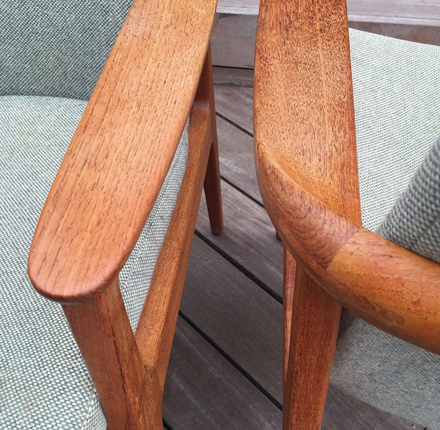 Amazing Danish design and craftmenship: Lovely teak armchair with wool fabric. 

Designed by Sigvard Bernadotte and manufactured by France and son. 

Sigvard Bernadotte was the uncle of Margrethe the 2nd - Queen of Denmark. 

He was an