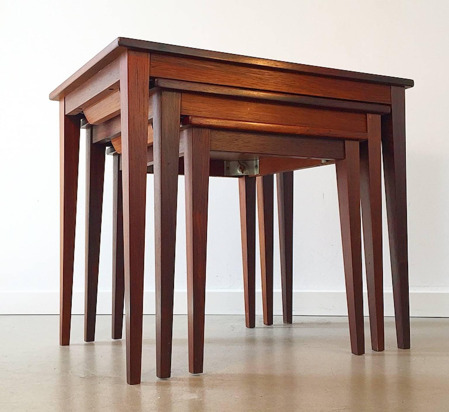 Very well kept Mid-Century set of nesting tables designed in the 1960s in Denmark attributed to Severin Hansen.

These three tables combine the high standards of Danish design: beautiful rosewood, high end design, lovely details and of course the