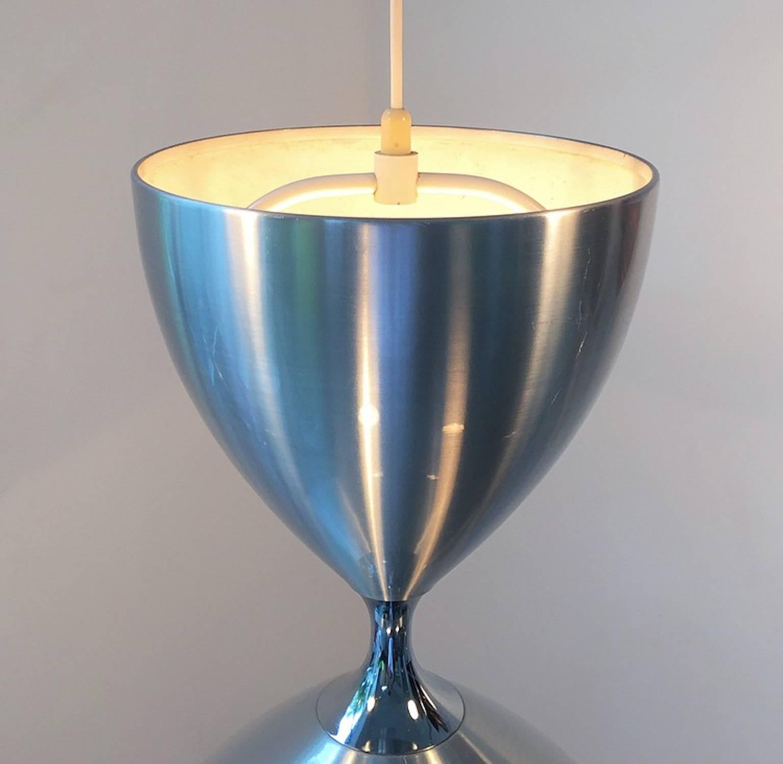 This pendant is one of the crown jewels of Danish design from the 1960s. Made by the world known head of design Jo Hammerborg for Fog & Mørup in 1968.

It's amazing size, shaped as a Diablo 1950s Stilnovo light with both up and downward lights,
