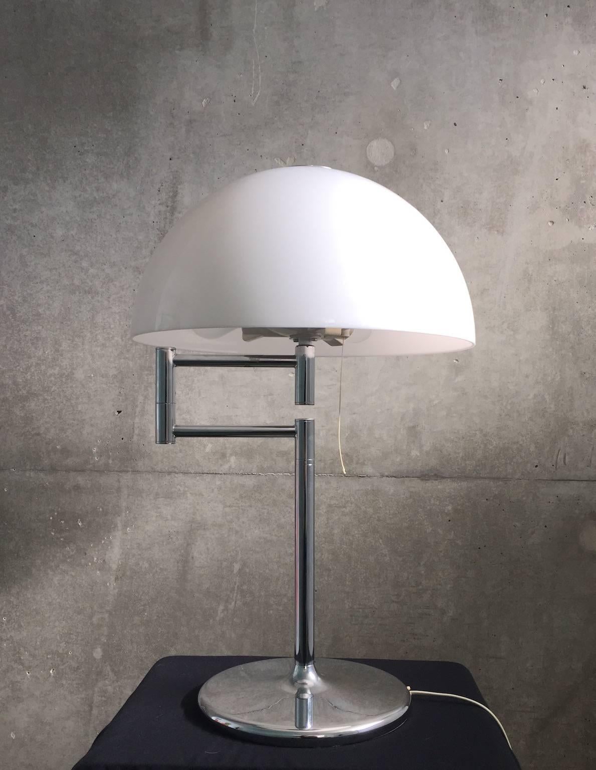 Classic Mid-Century Italian design lamp. 

Very high built quality with the weight of 16 kg/35lb 4.38oz. 

Contemporary modern piece.

Made of chrome lacquered steel with shade of thick white acrylic. 

Three bulbs 60 W Edison screw fitting