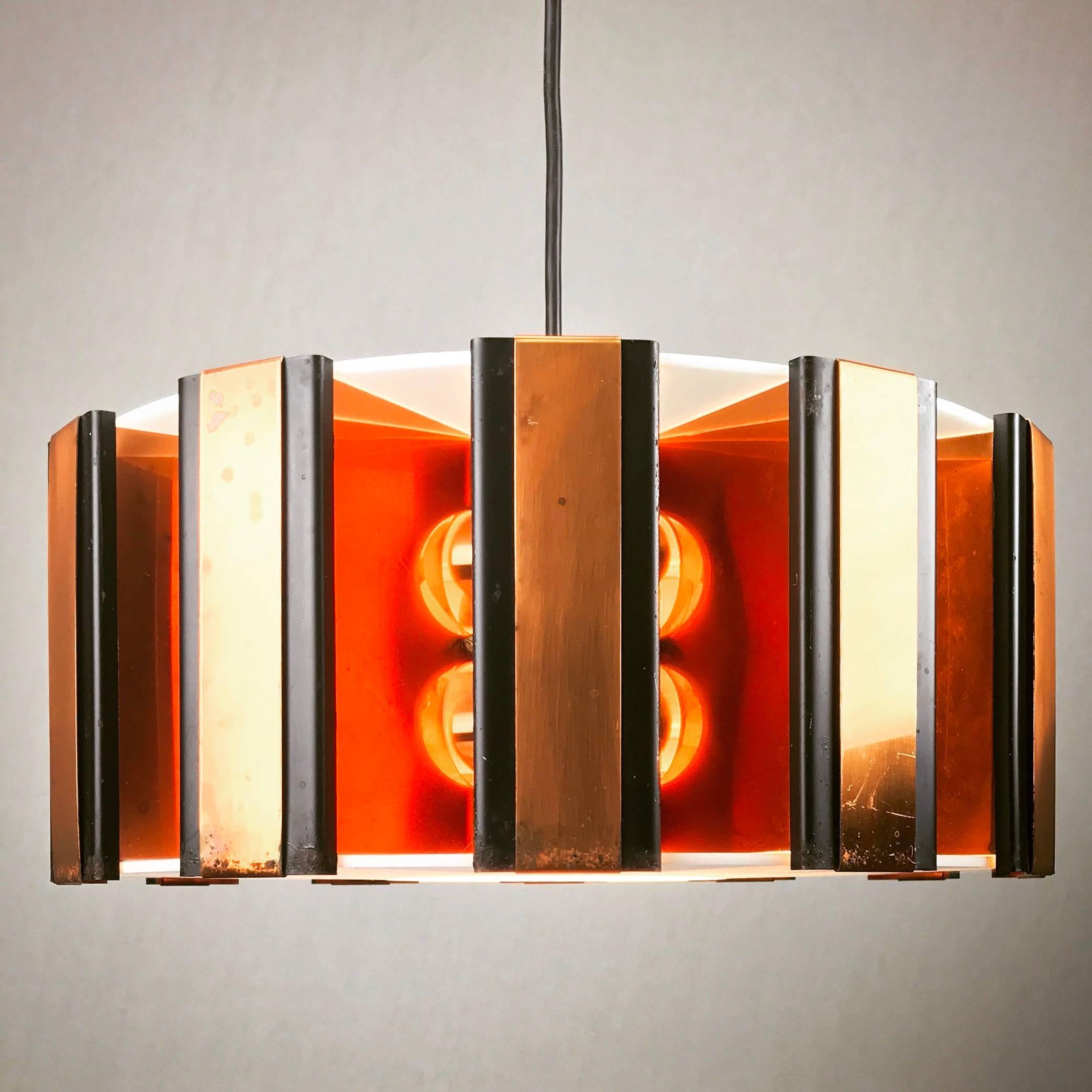 Stunning piece of design by Werner Schou for Coronell Electro mid-1960s.

Please look closely at the pictures and you will see the complexity of the design, as well as the high standard of quality. Light is being distributed in all directions -