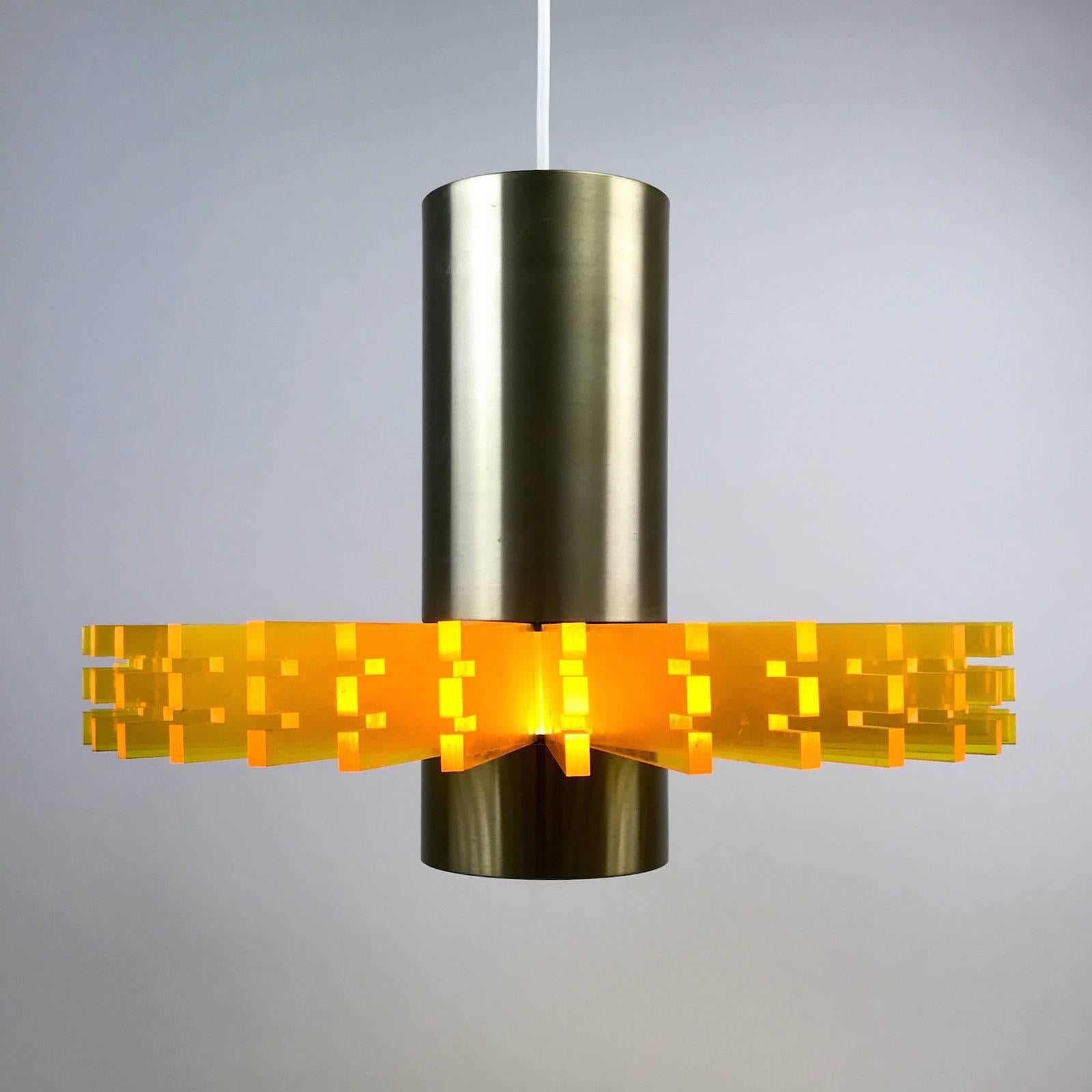 It is hard to tell that this space age design piece from the 1960s originally was created for a danish Church (Strandby), but proves the creativity and visionarity of the designer Claus Bolby. It was made as large chandeliers with a diameter of 80