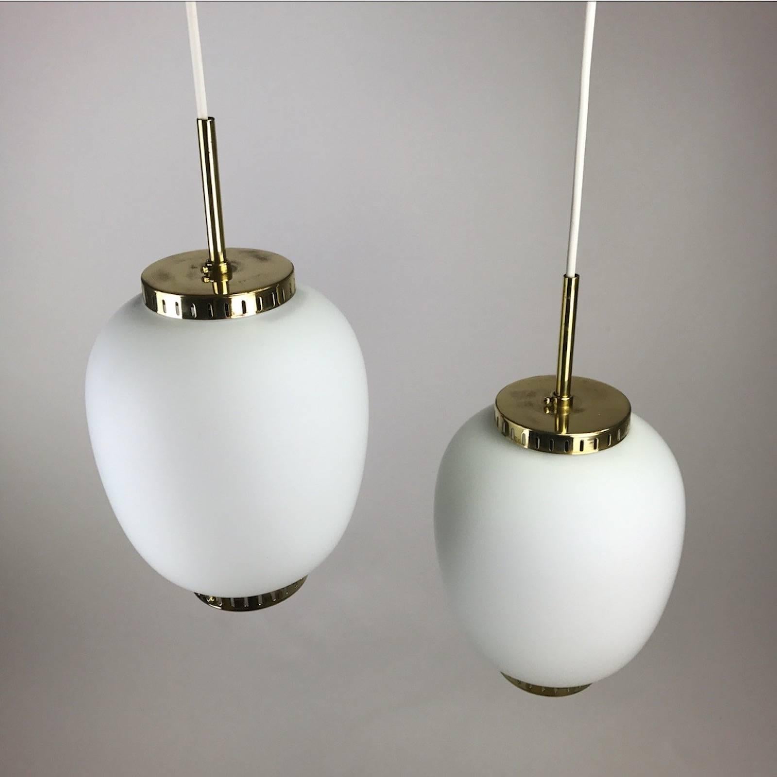 Bent Karlby was clearly inspired by the Chinese paper lanterns when he designed these Midcentury lights and they are also called China Pendant. A stunning Classic set of glass pendants by Bent Karlby for Lyfa, Denmark, early 1960s.

The 