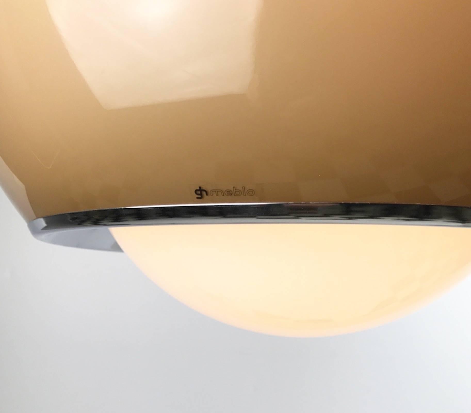 Stunning piece of fine Italian design by Harvey Guzzini called "Bud Grande", 1968. 

The light consists of a large sphere shaped shade with a smaller shade below. Soft smoked color which fades from light to dark color at the bottom where