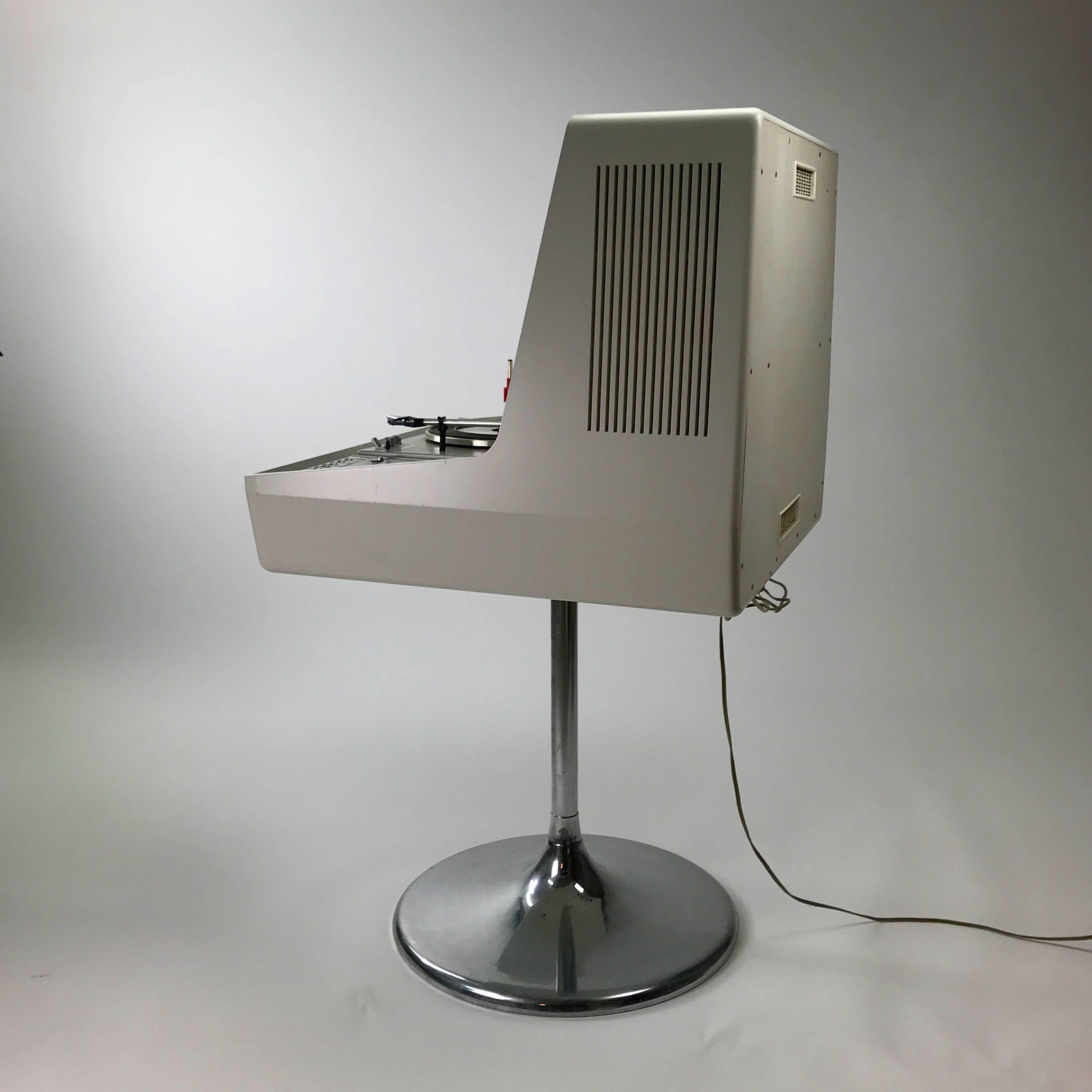 Rare and iconic collectible piece of 1970s hifh fidelity sound system by Rosita Tonmöbel. 

Beautiful chrome tulip base leads right up to the all-in-one music center which consists of cassette deck, and turn table by Philips as well as the launch