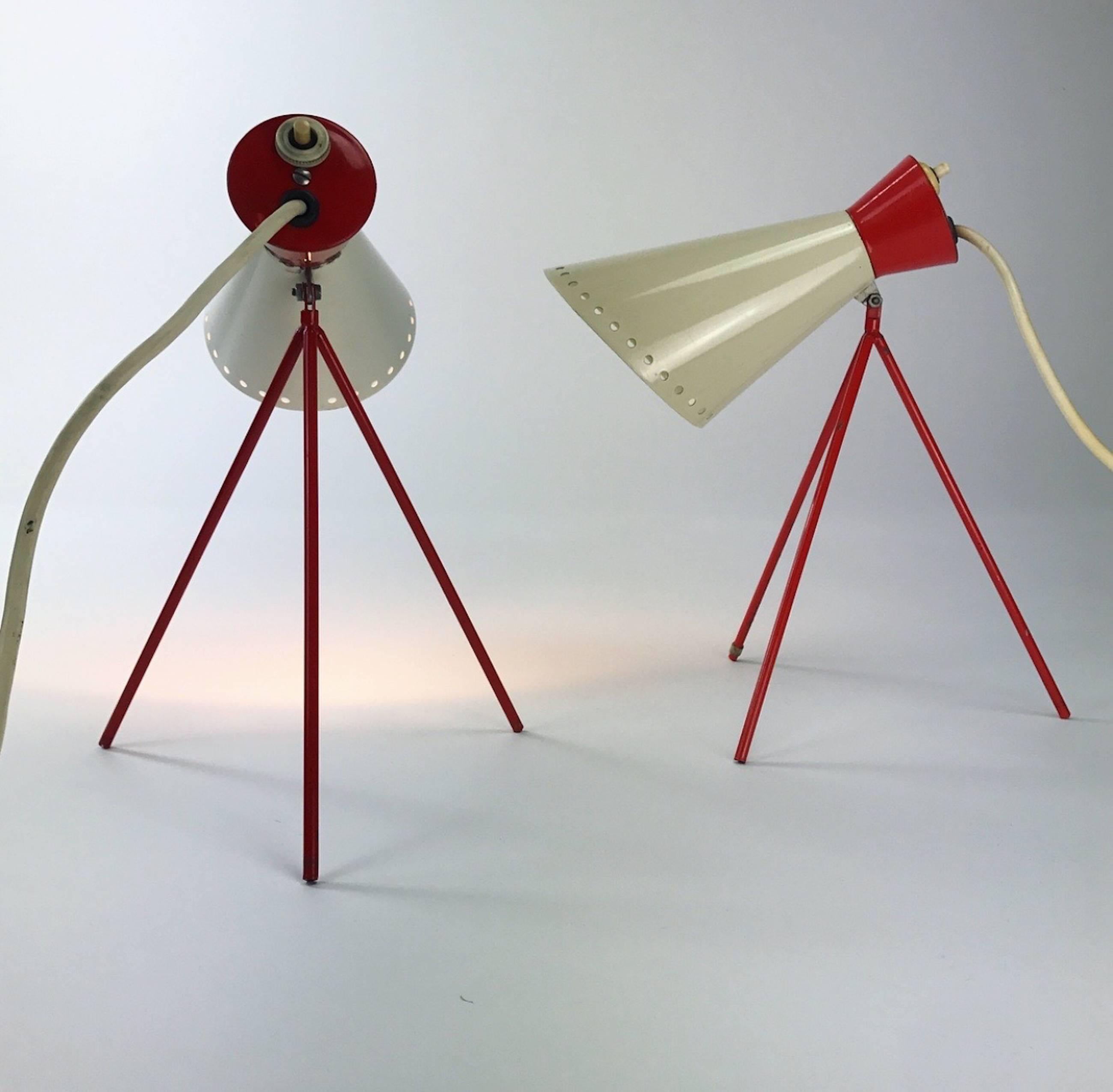 The iconic set of Josef Hurka table lamps manufactured by Napako, Czech, 1958.

First presented at the Expo 1958 in Bruxelles this beautiful diabollo shaped table lamp has become an icon for the atomic age era of the European fifties