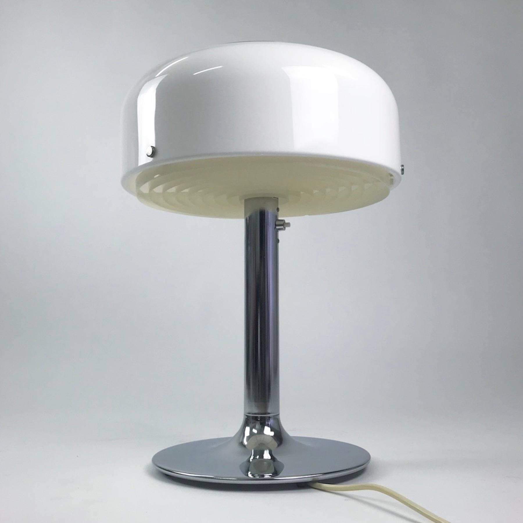 This incredible light is a stunning piece of Swedish light design. 

The Knubbling was designed in 1966 by Anders Pehrson, head of design at Ateljé Lyktan, Sweden. 

The white shade combined with the chrome stem adds coolness to the light but
