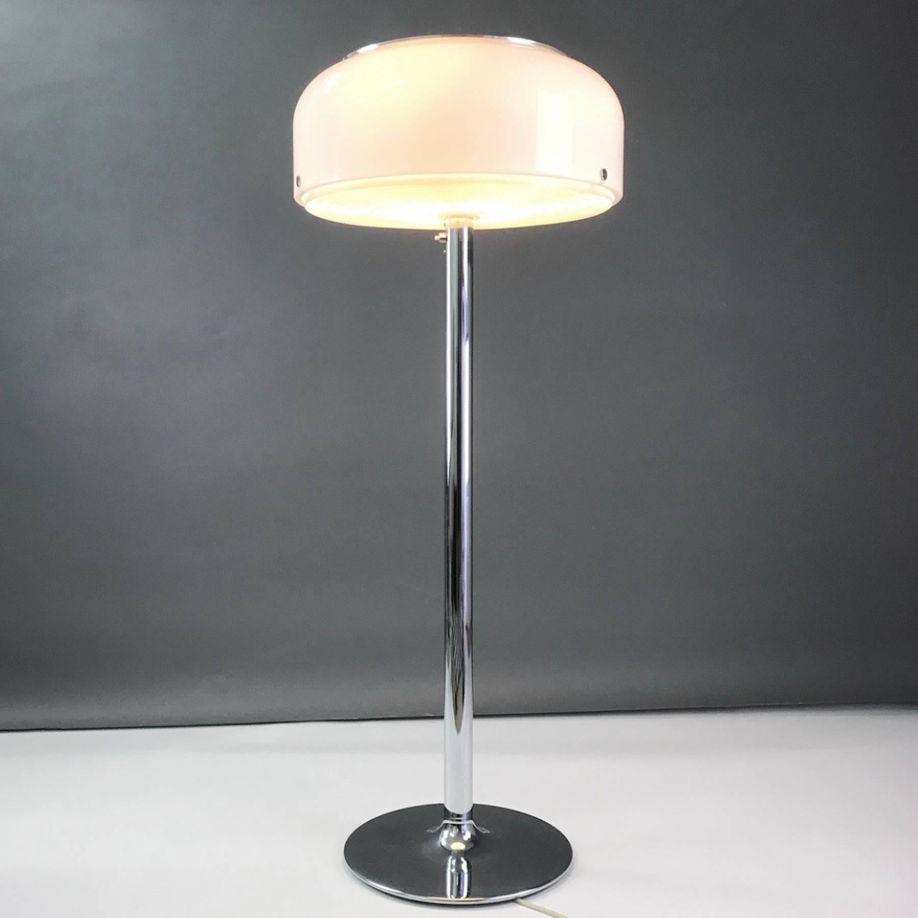 This amazing floor lamp is one of our favorites. Elegant, majestic and contemporary covers this beauty the best. 

The big white shade gives a lovely warm light when lit and the chrome stem and white shade will fit in almost every home; you can go