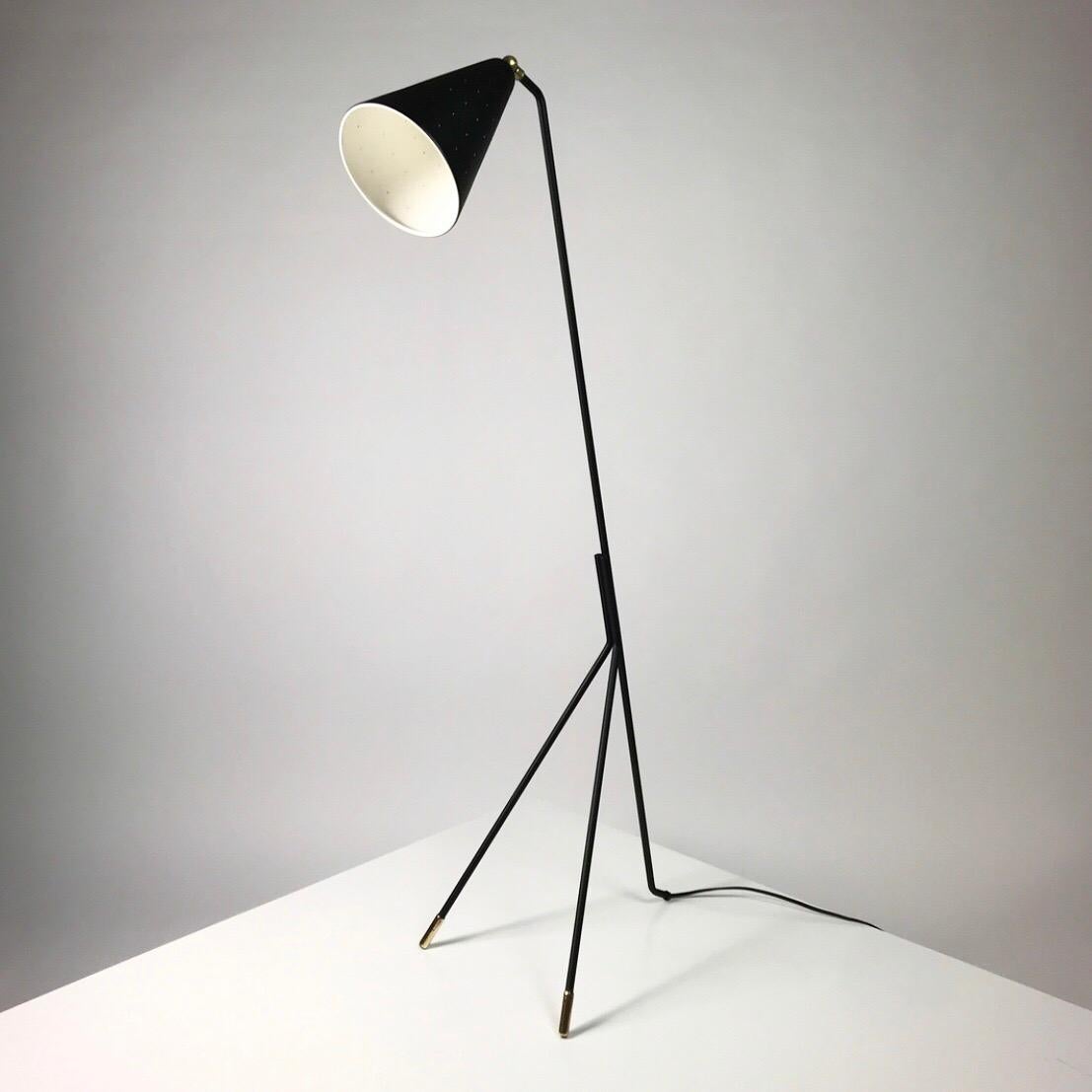 Svend Aage Holm Sørensen is one of Denmarks most productive lighting designers of all times. Ranging from the late 1940s to start 1990s. 

This rare floor lamp is a good example of the 1950s design period in Scandinavia which also indicates the