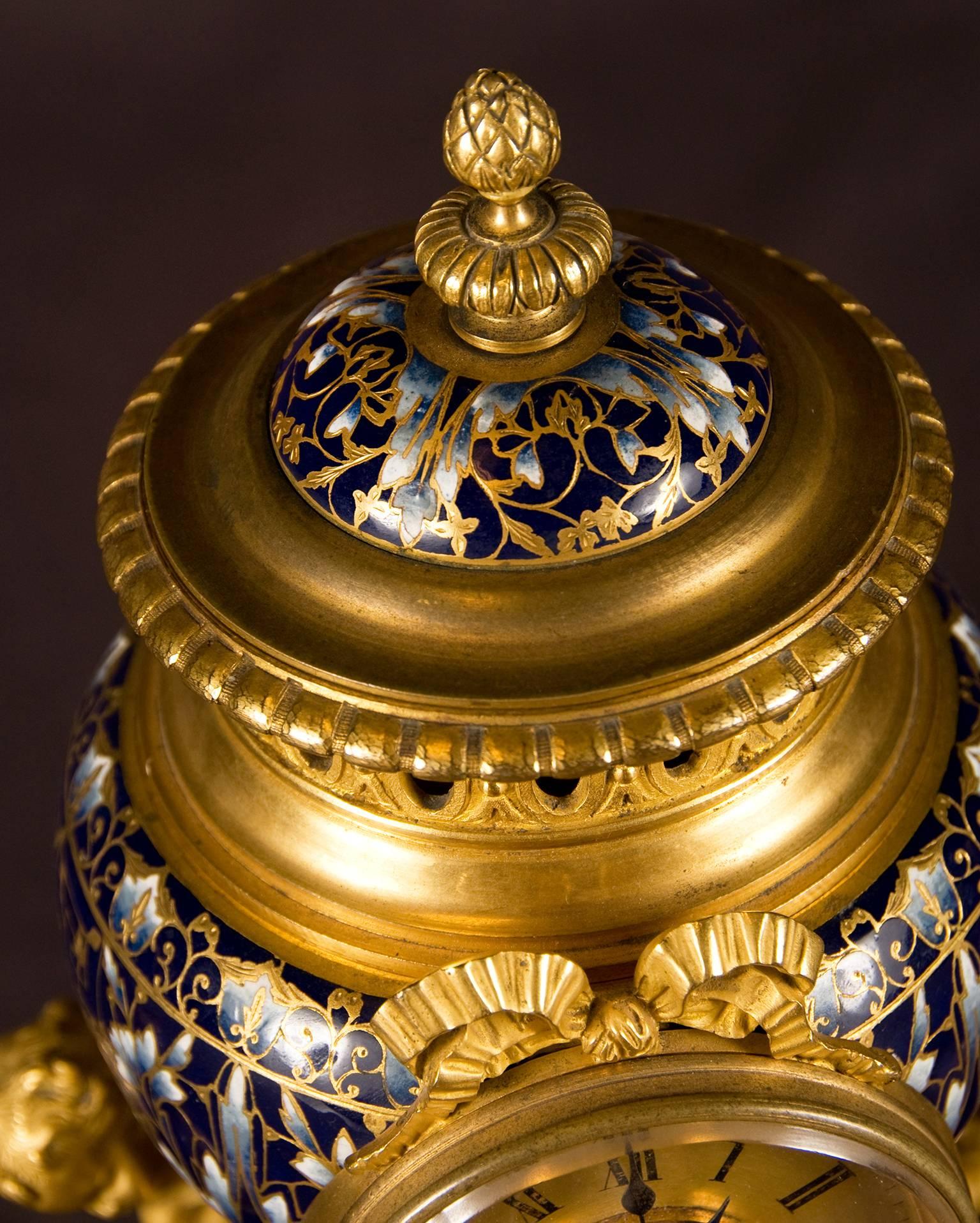 Louis XVI Three-Piece Champlevé Enamel Gilt Brass Clock Garniture, France, 19th Century For Sale