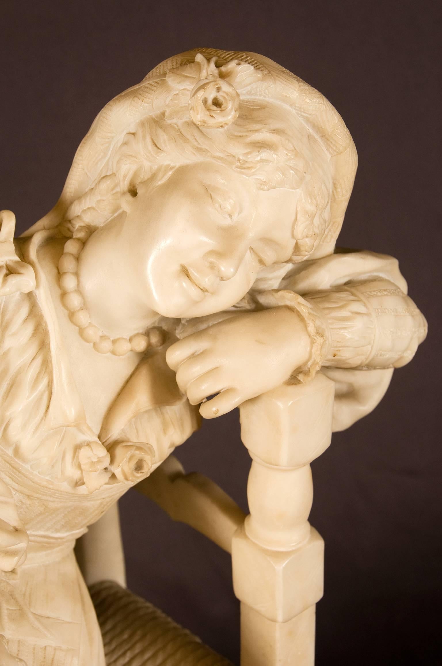 Lovely romantic Italian alabaster sculpture of a young girl seated in a cane chair listening to music, as she dreams away and holds a tambourine in her right hand. The beholder can almost see the tapping of her right foot to the rhythm of the music.