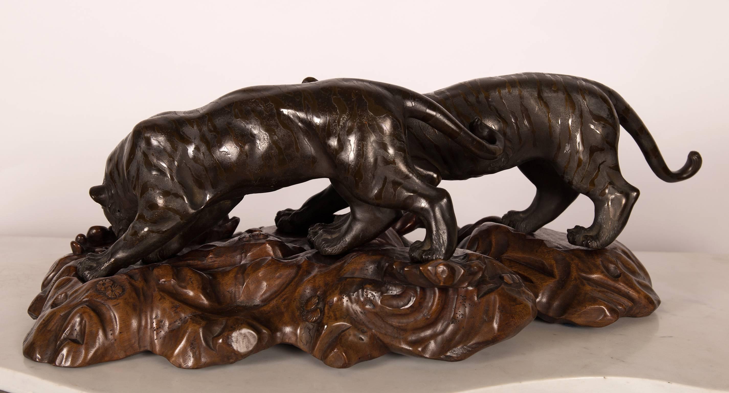 Carved Meiji Period Japanese Bronze of Two Preying Tigers For Sale