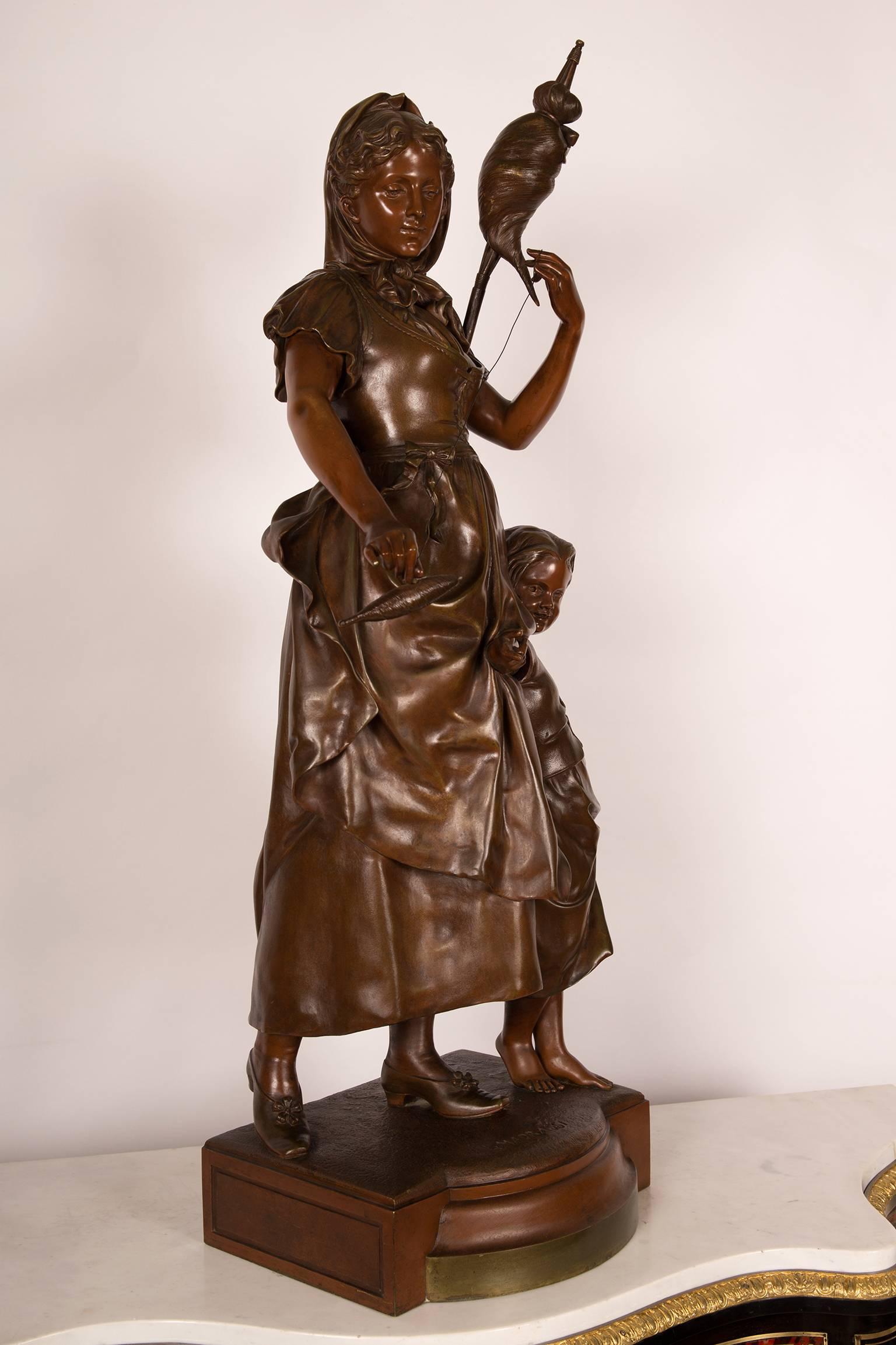 French Sculpture in Bronze Signed L. Madrassi a Child and His Mother Holding a Distaff For Sale