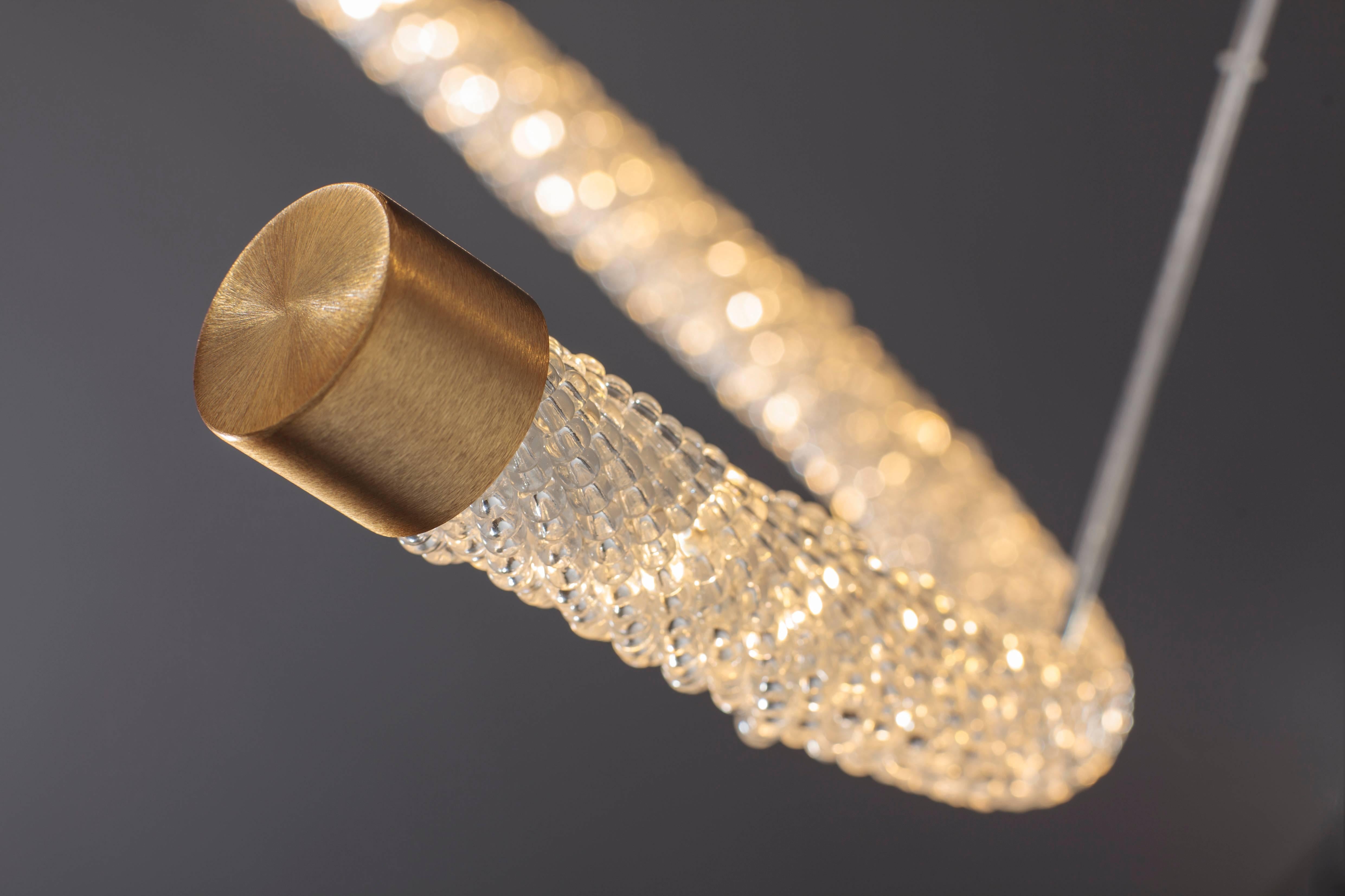 The Mico series explores the concept and experience of pure light, personifying Baroncelli’s commitment to progressive design and exceptional craftsmanship. Available as a ring or baton, the warm and natural LED radiates throughout each framework,