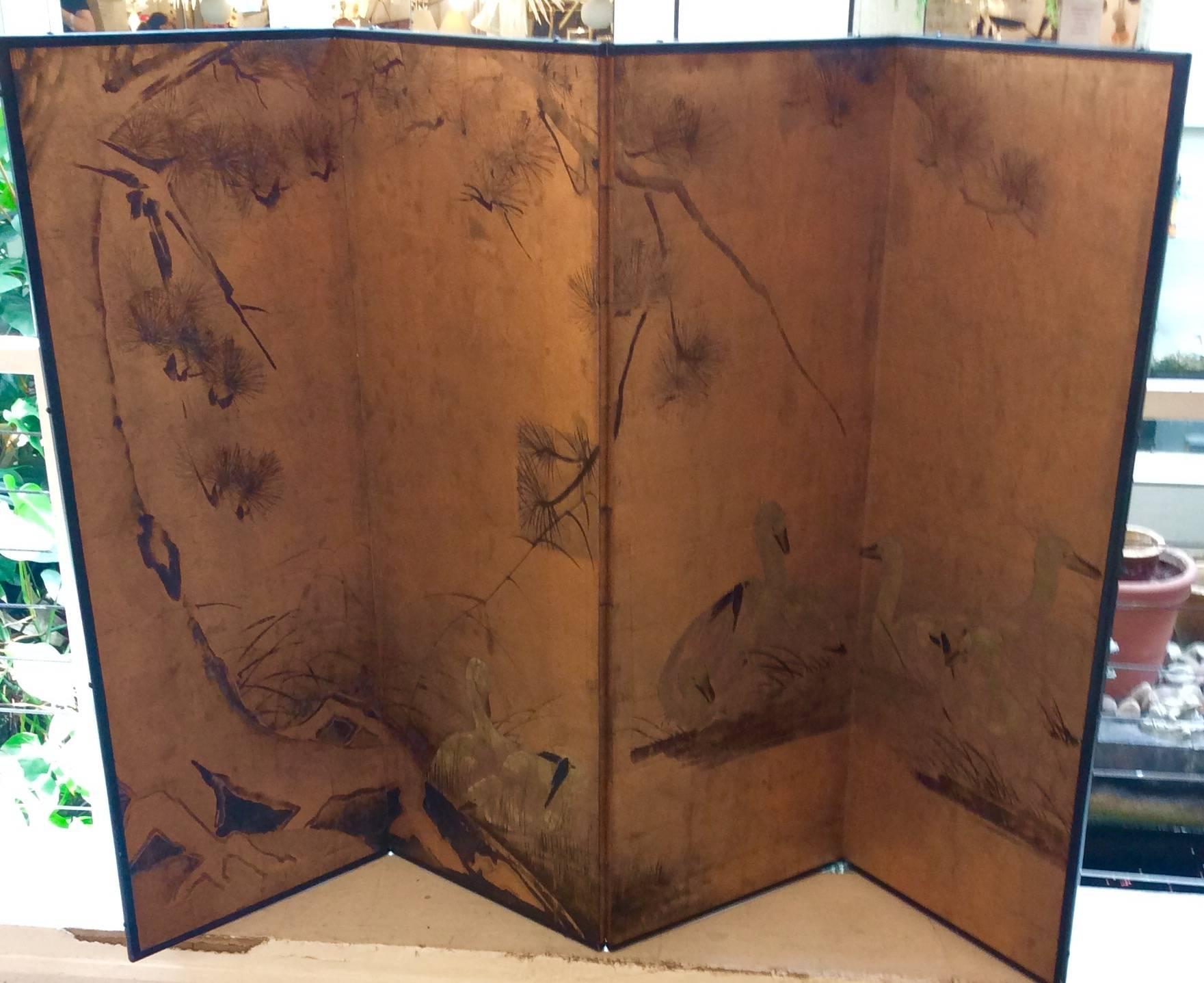Mid 20th century hand-painted wall paper screen.
Four-panel gold leaf background with hand-painted scene.