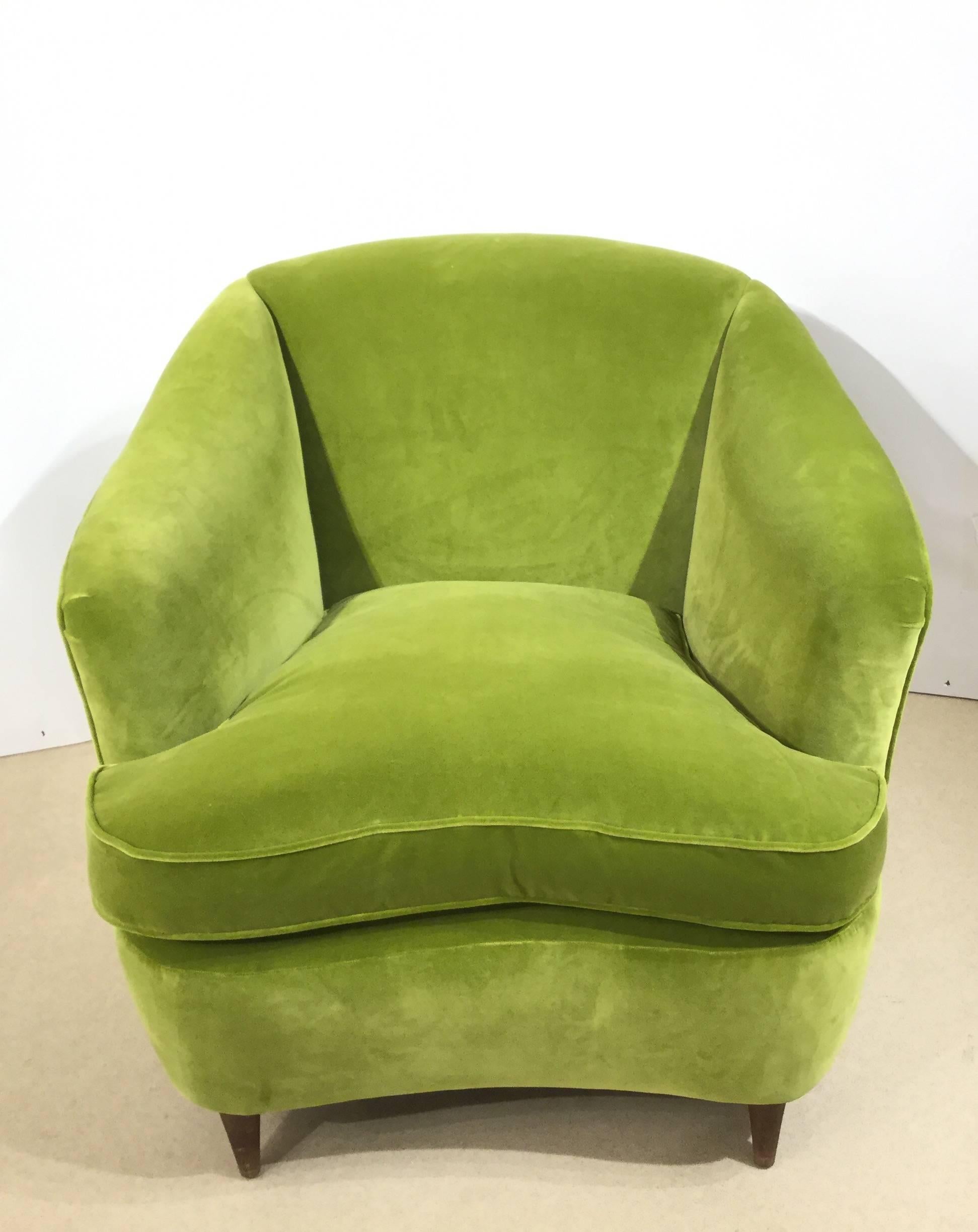 An Italian designed Art Deco armchair reupholstered in velvet with feather cushion, circa 1930.