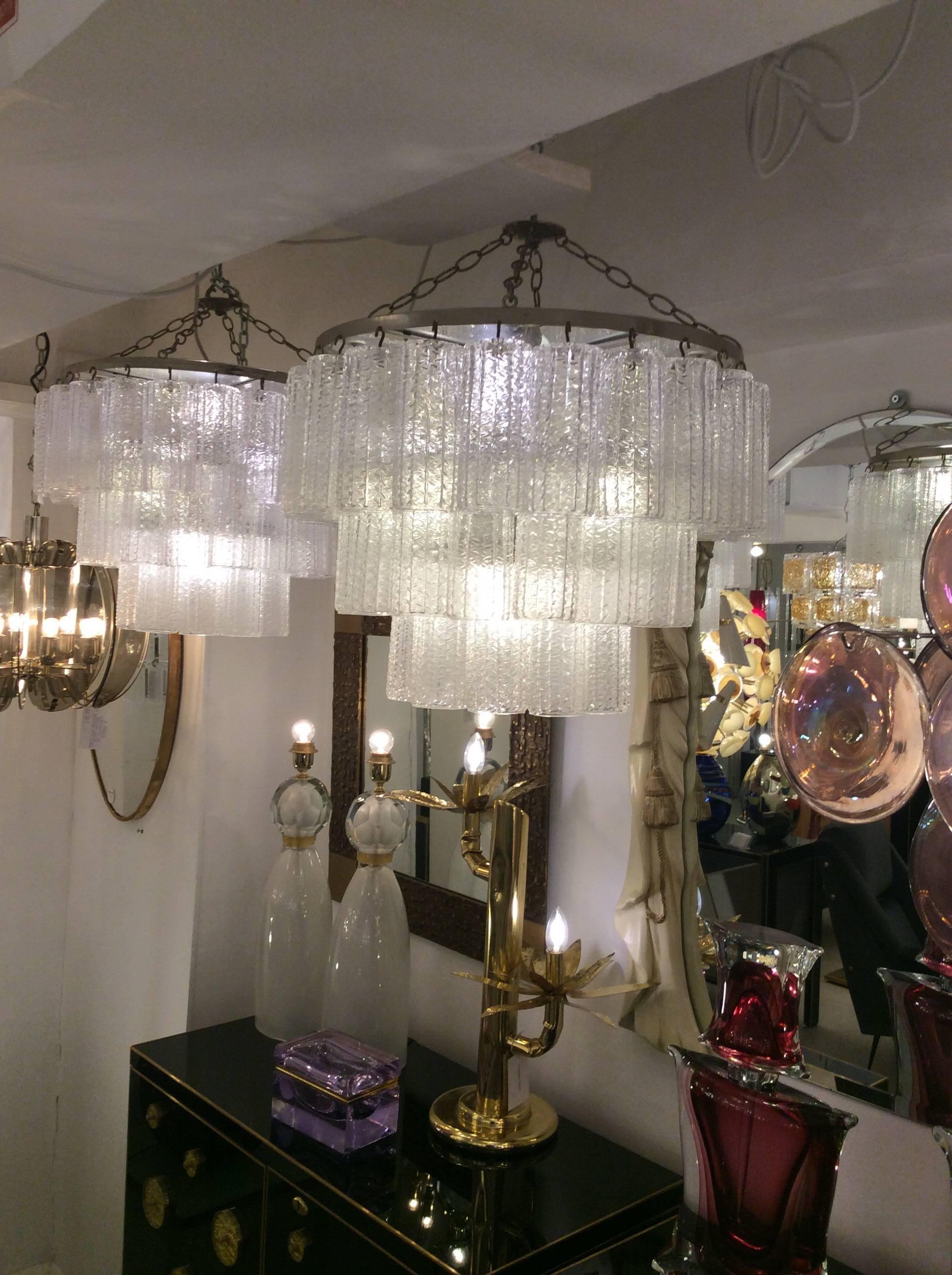 A pair of Italian designed chandeliers by Venini three-tier Murano glass, circa 1950.