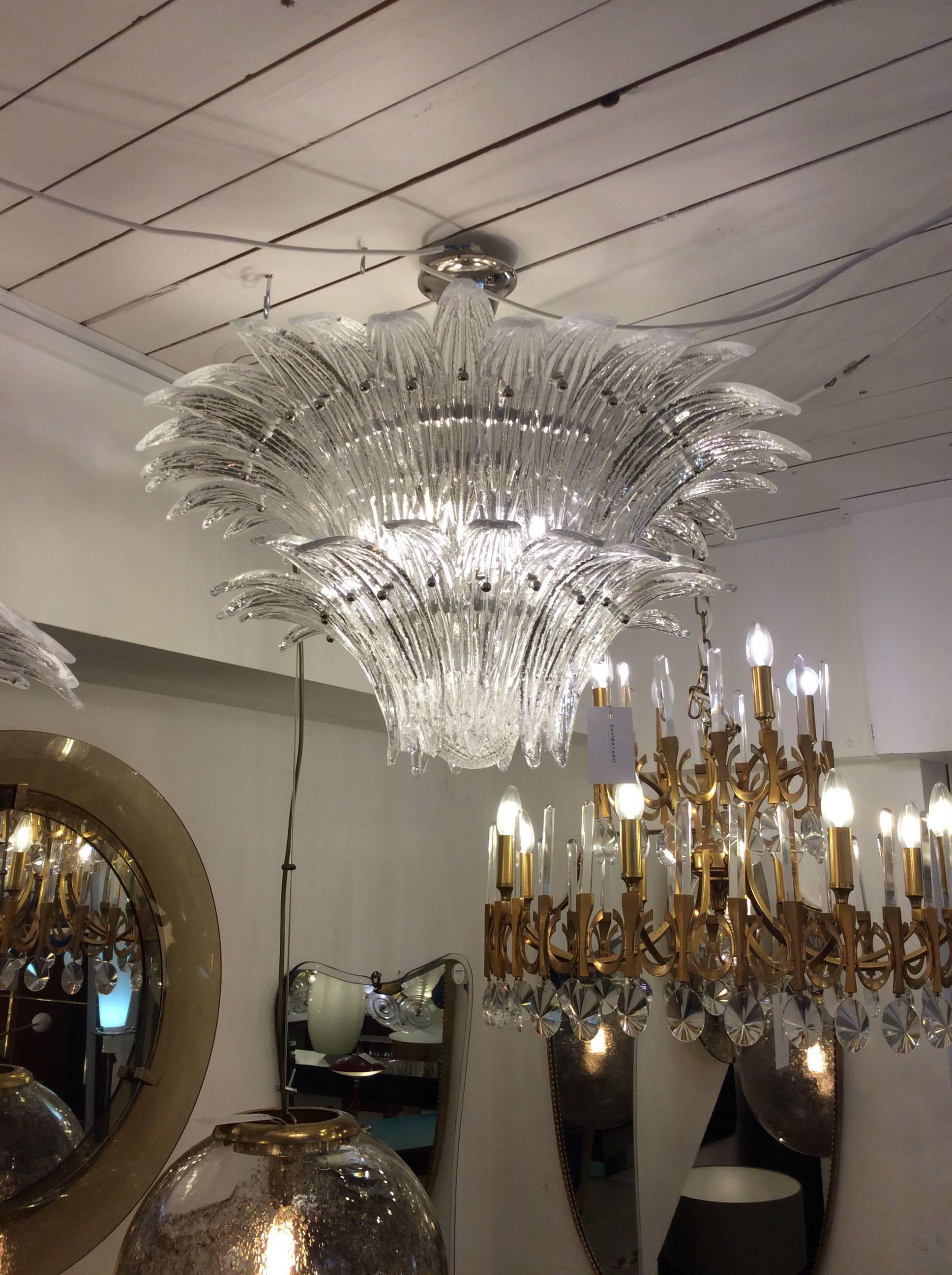 Italian Palmette chandelier with clear Murano glass leaves arranged on two  tiers and mounted on nickel-plated metal frame