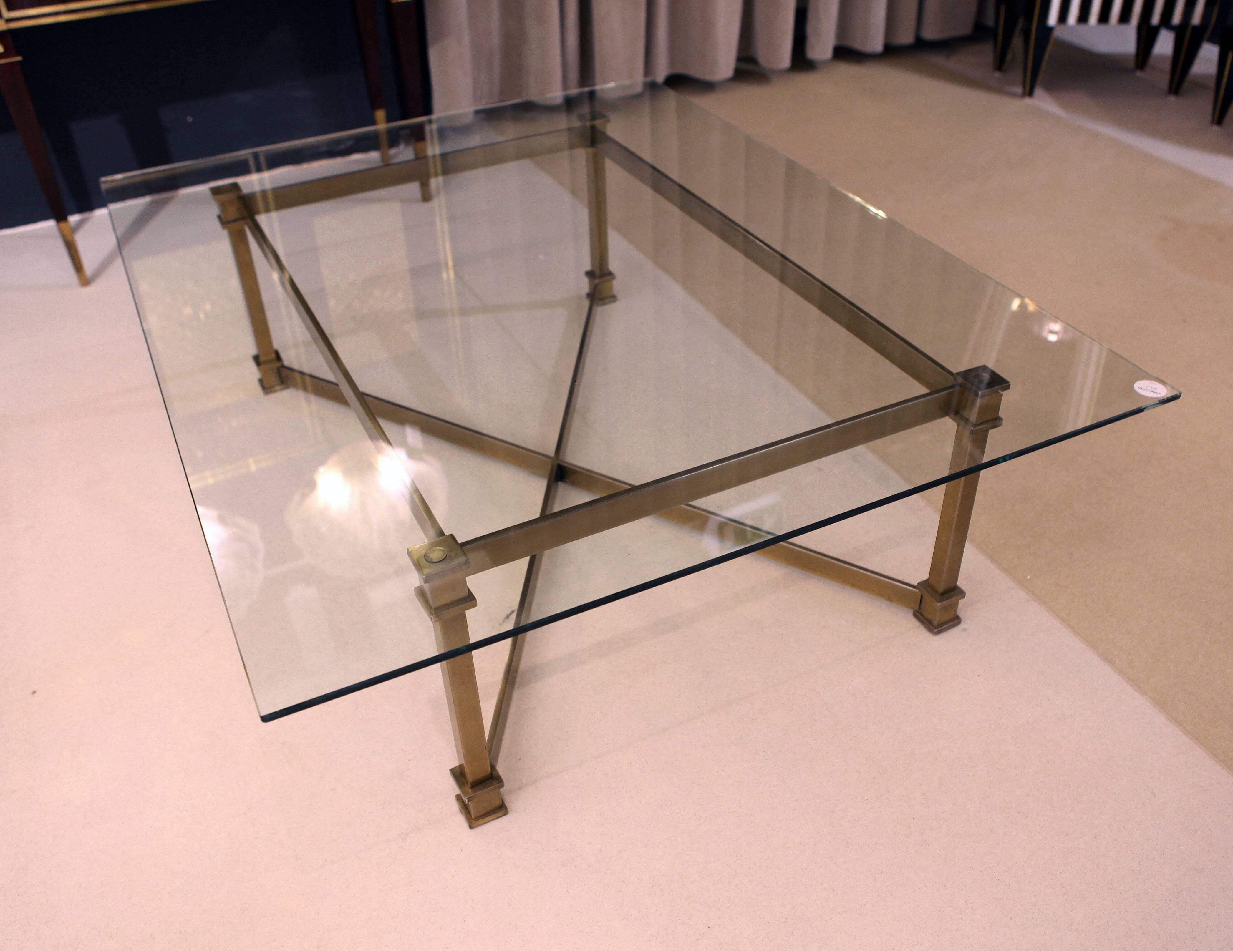 A French coffee table in brass and glass neoclassic design attributed to Maison Jenson, Mid-Century.