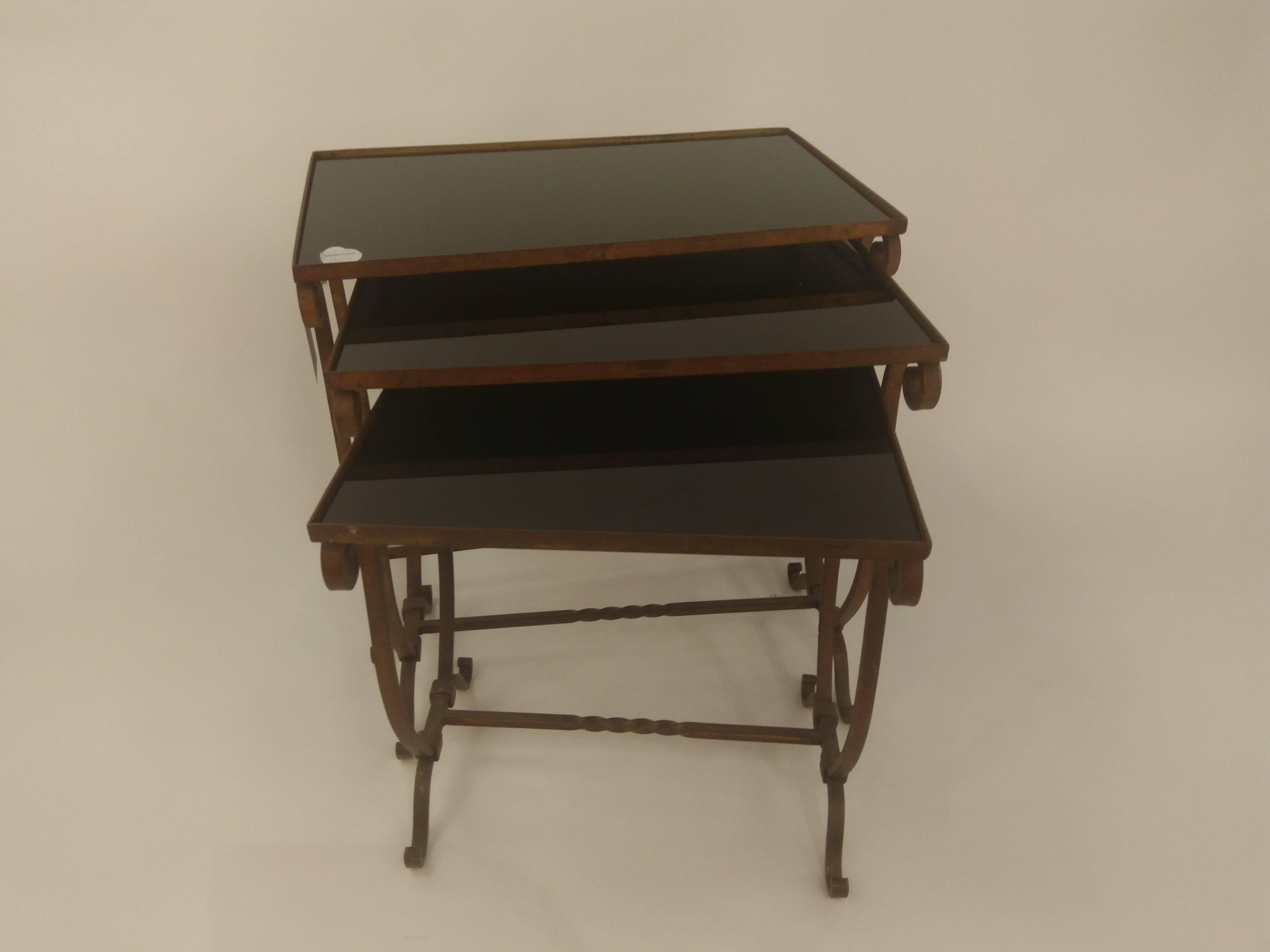 Hollywood Regency Italian Designed Nest of Three Tables Forged Iron with Black Glass, 1950