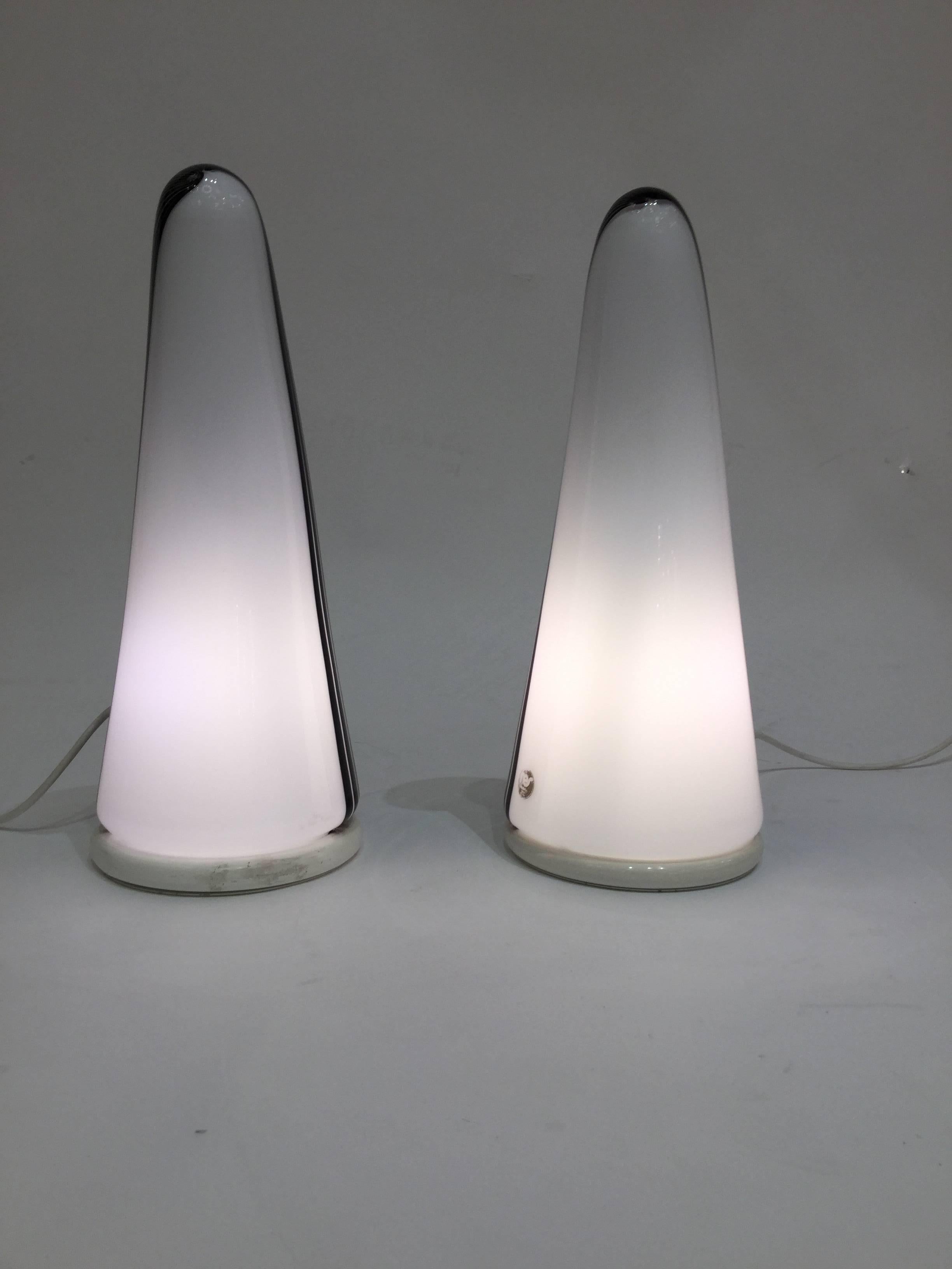 Stripped Murano glass pair of lamps on painted metal base.