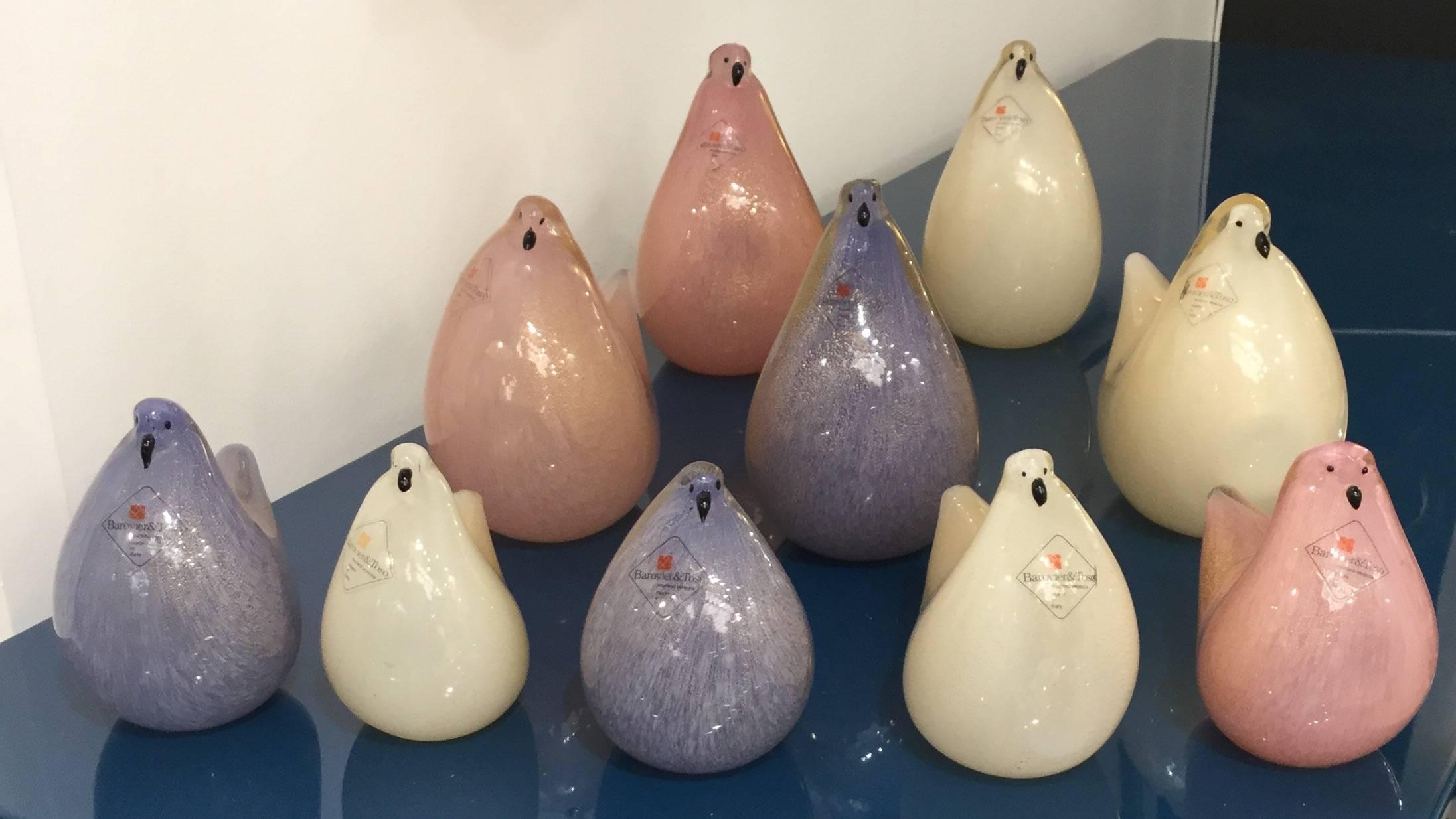 Set of ten elegant doves in handblown Murano glass with gold inclusion. Signed by Barovier and Toso

Can be sold individually.