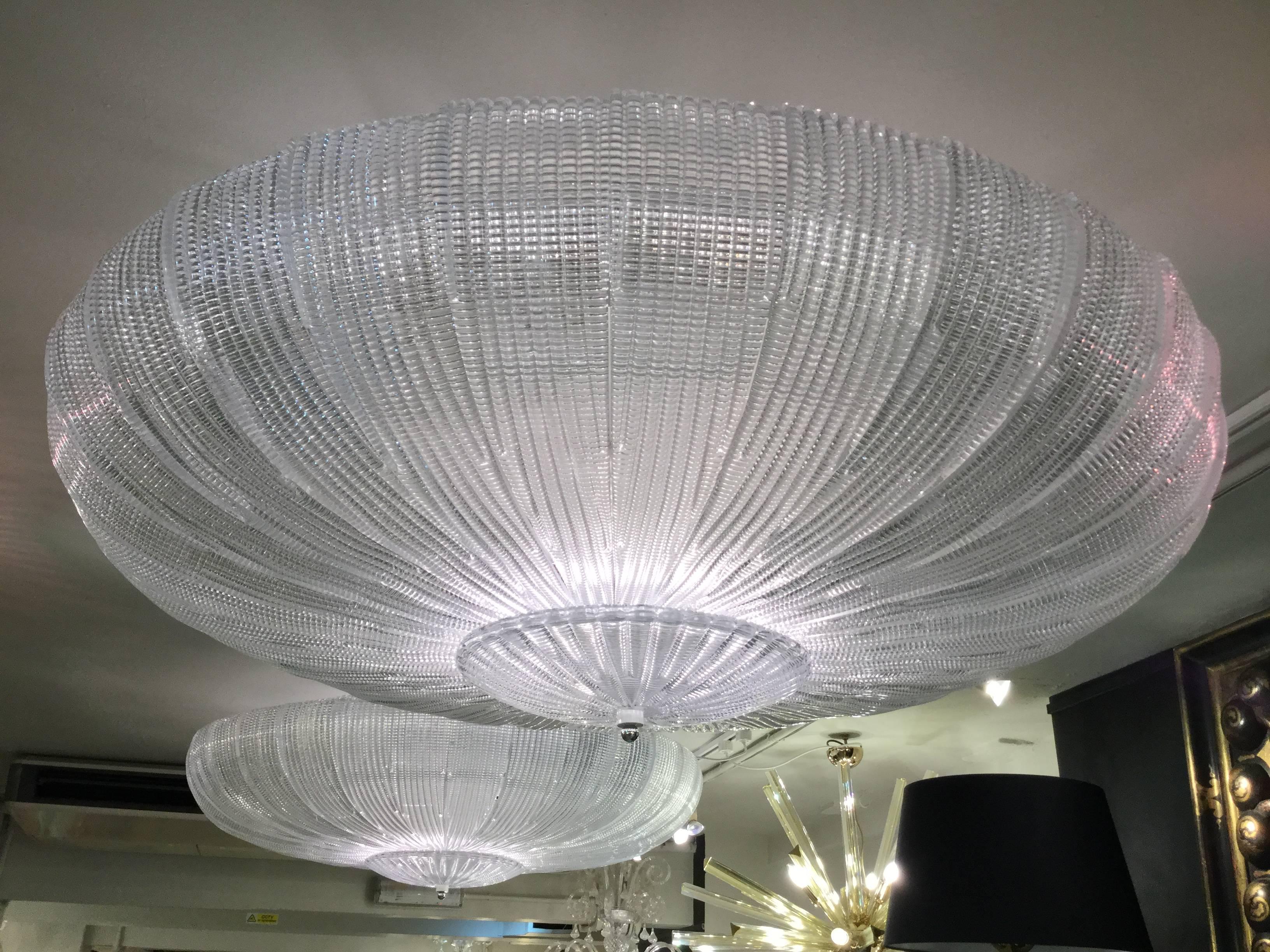 Fantastic Murano glass ceiling lights. The  lamp is made of 26 mouth-blown hand-formed leaf-form ice glass panels plus a huge glass dish as a bottom. The wiring is perfect, which has been replaced in recent time, so the lamp is in fine working
