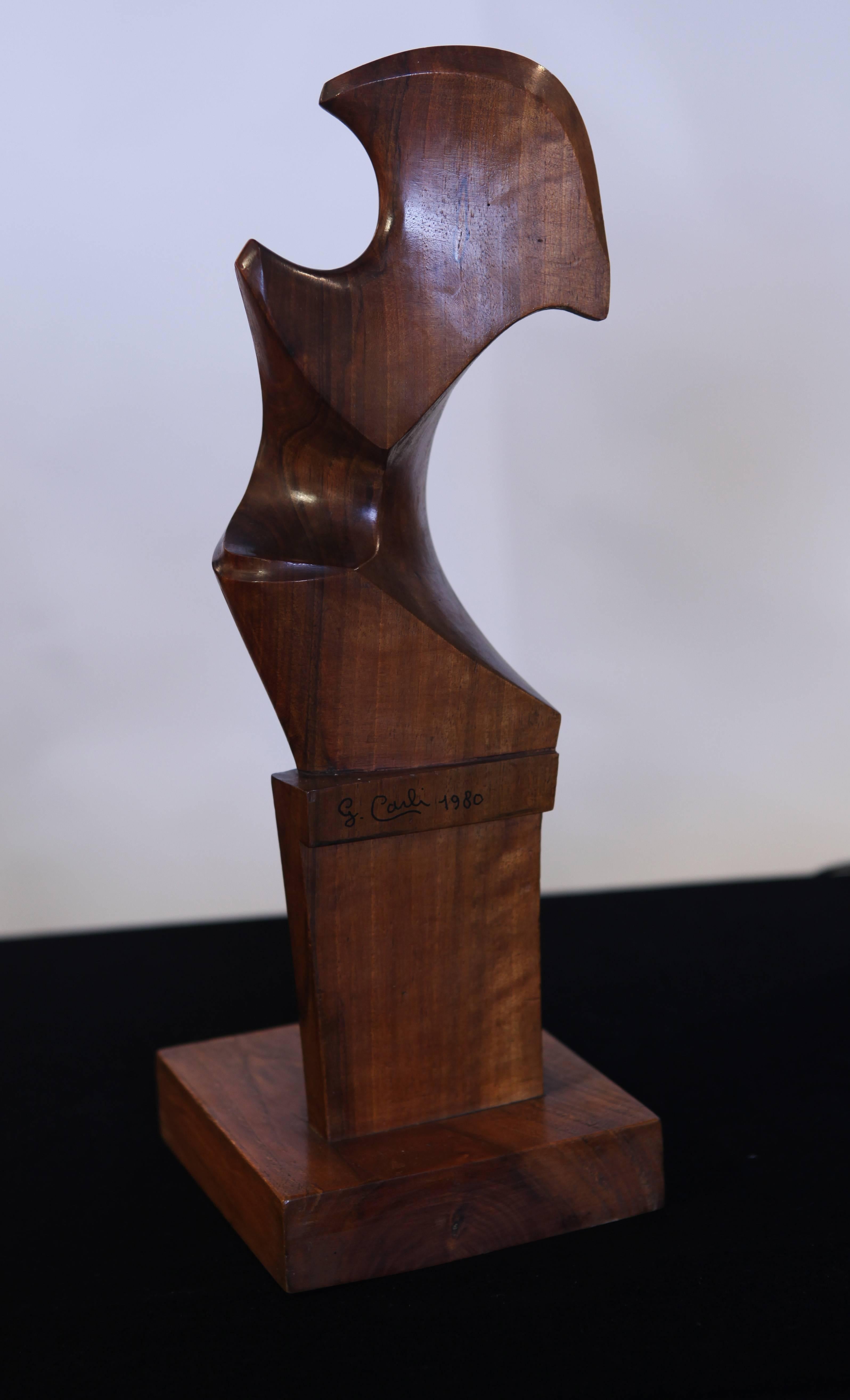 1980, wood carving sculpture signed by G. Carli.

 Giuseppe Carli was one of the foremost maestro remeri, or forcoli carvers, in Venice. He also carved sculptures in the forms of forcoli. The fórcola is an oarlock used on the gondolas of Venice.