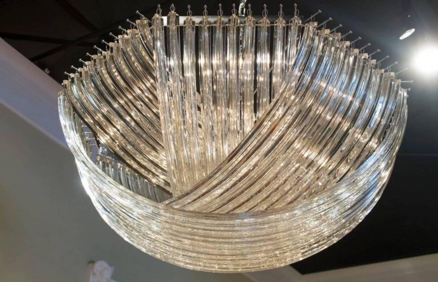 Original vintage chandelier with clear Murano Glasses blown using Triedri technique to produce four point curved shards mounted on chrome frame by Carlo Nason for Venini/ Made in Italy in the 1960s. 