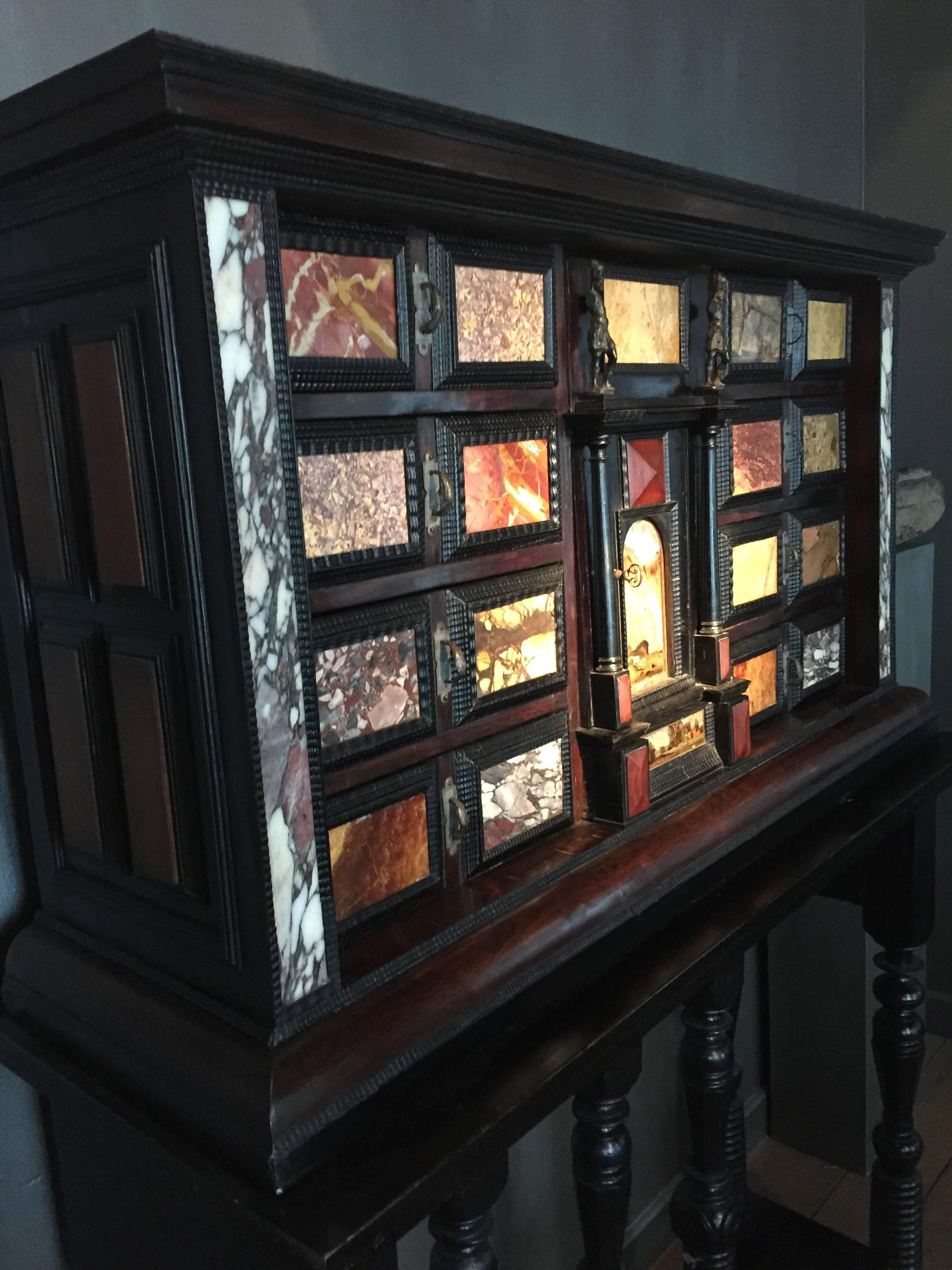 Exceptional Italian display cabinet with drawers decorated with several types of Italian marble.
great old users patina, extremely decorative furniture to work with
nice wooden base.