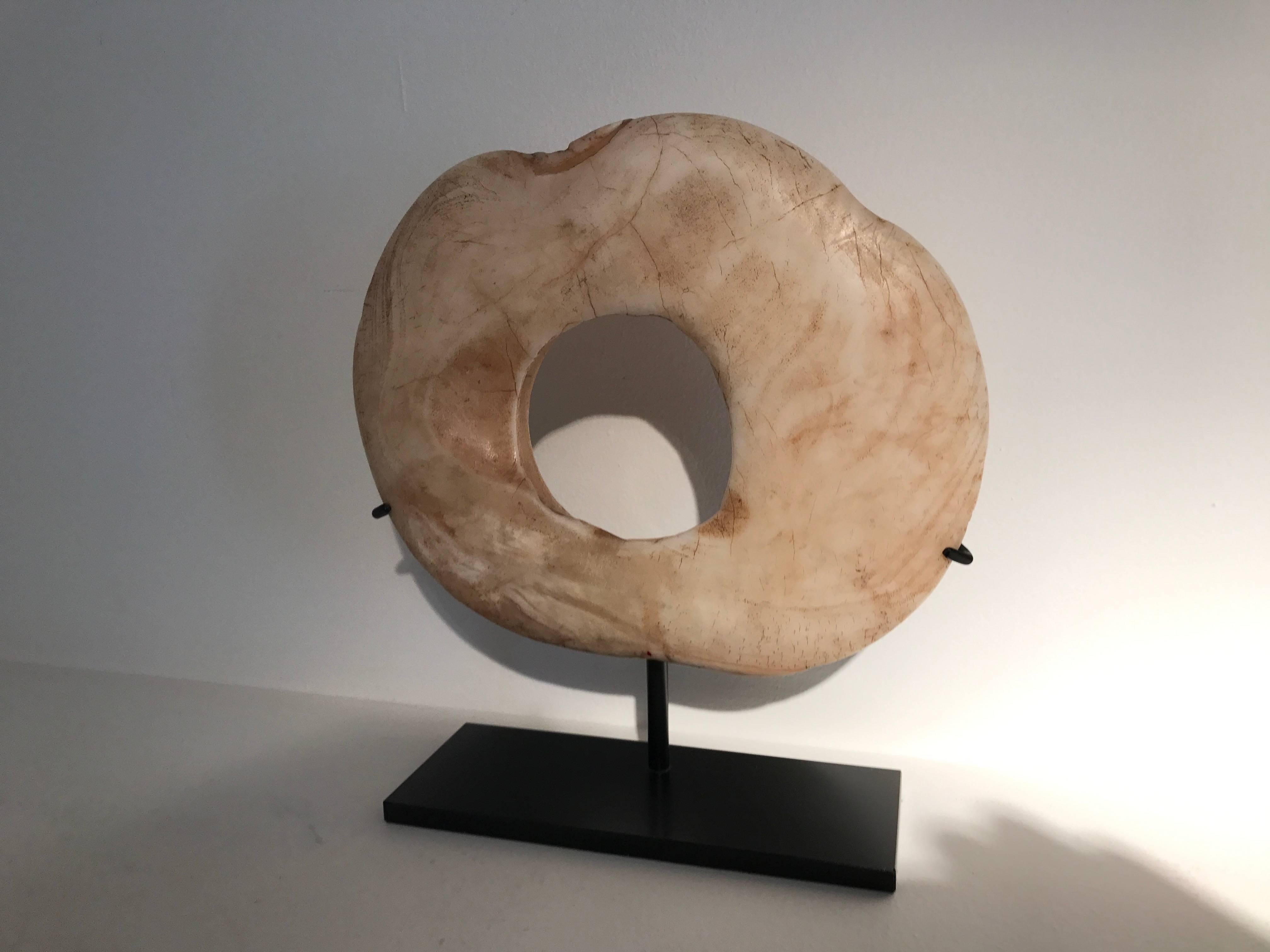 Exceptional Boiken made of the Tridacna gigas shell,
diameter is 23 cm
diameter hole is 8 cm
thick 3 cm.

Nice to place as a collection of three pieces.