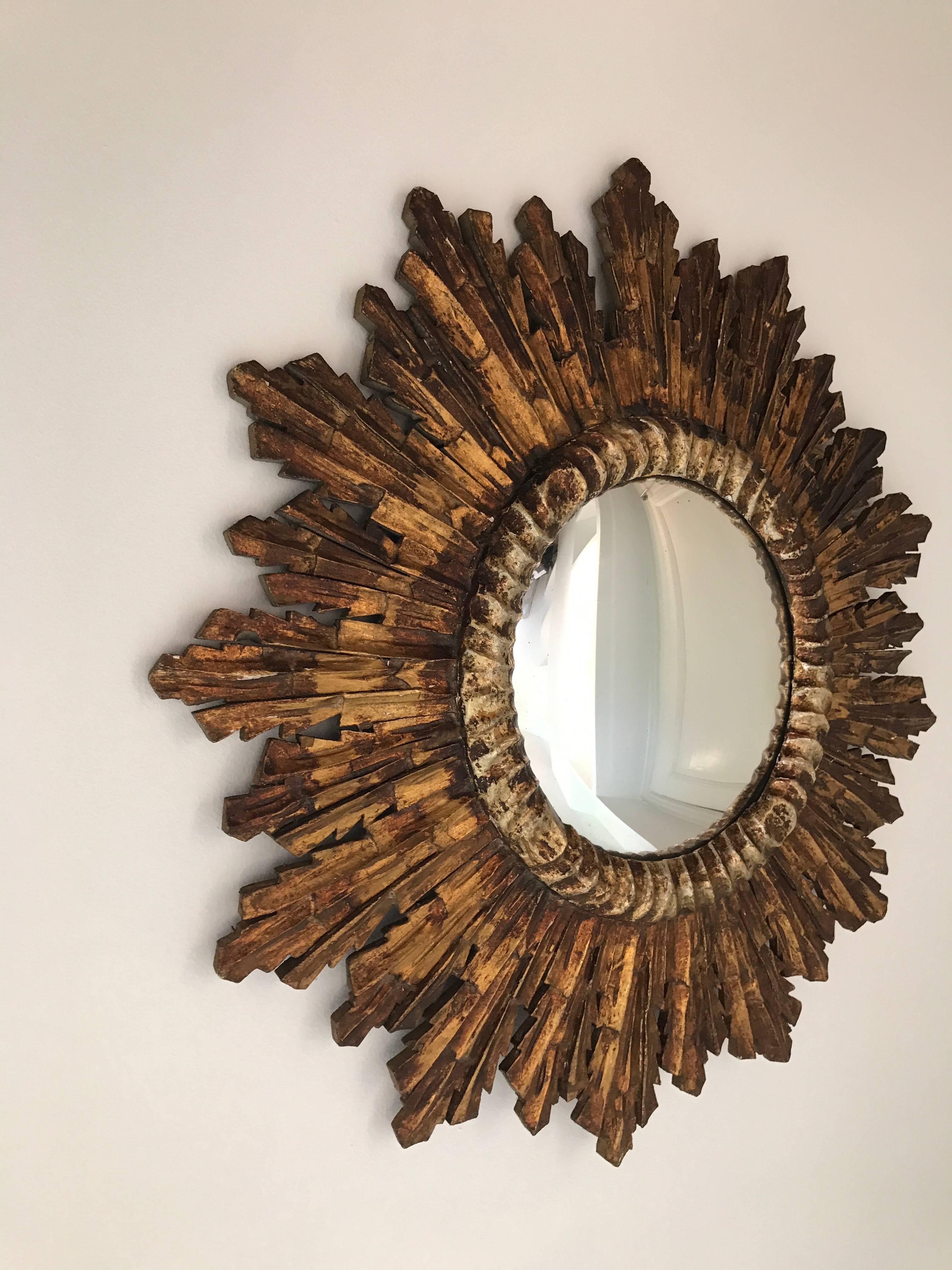 French sun shaped gold patinated mirror, 1970.