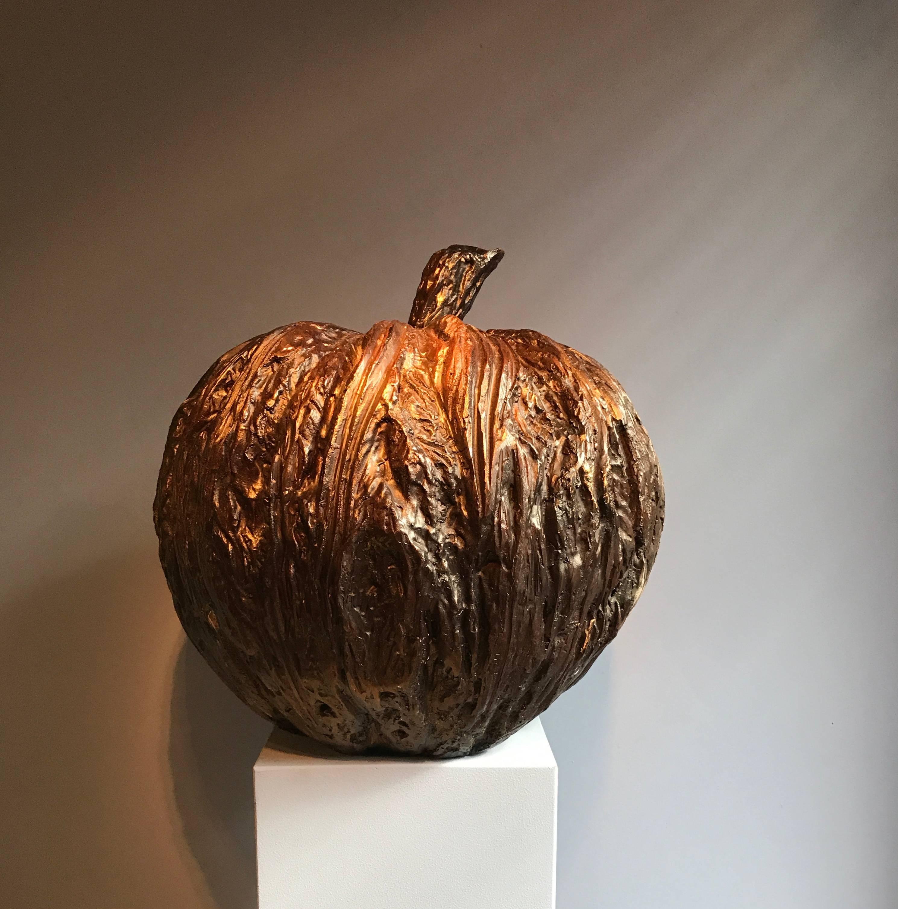 Bronze contemporary artwork by Asian artist, Chanin Pan
Bronze apple.