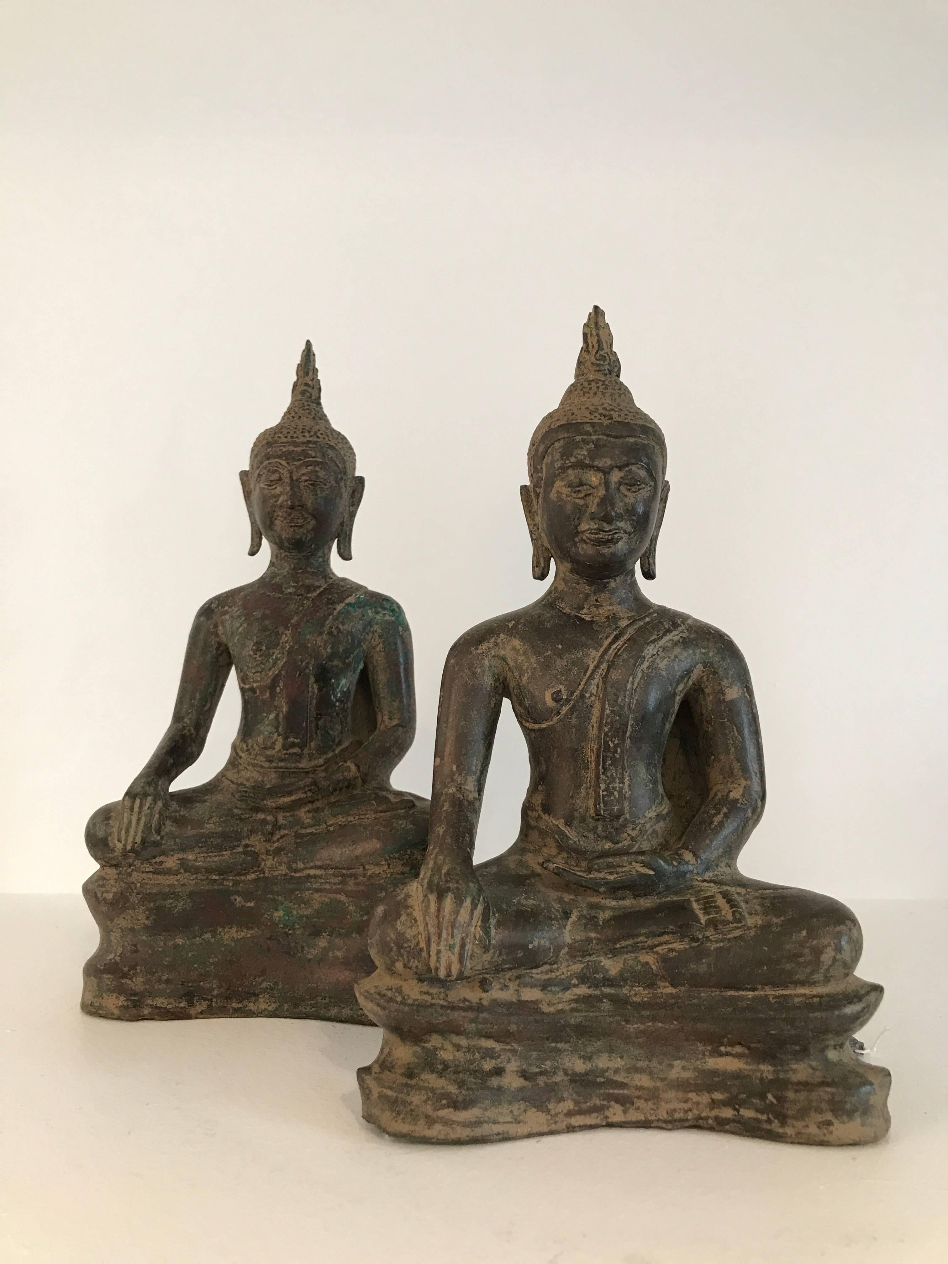 Polished Very Exceptional Almost Identical Pair of Bronze Buddhas For Sale