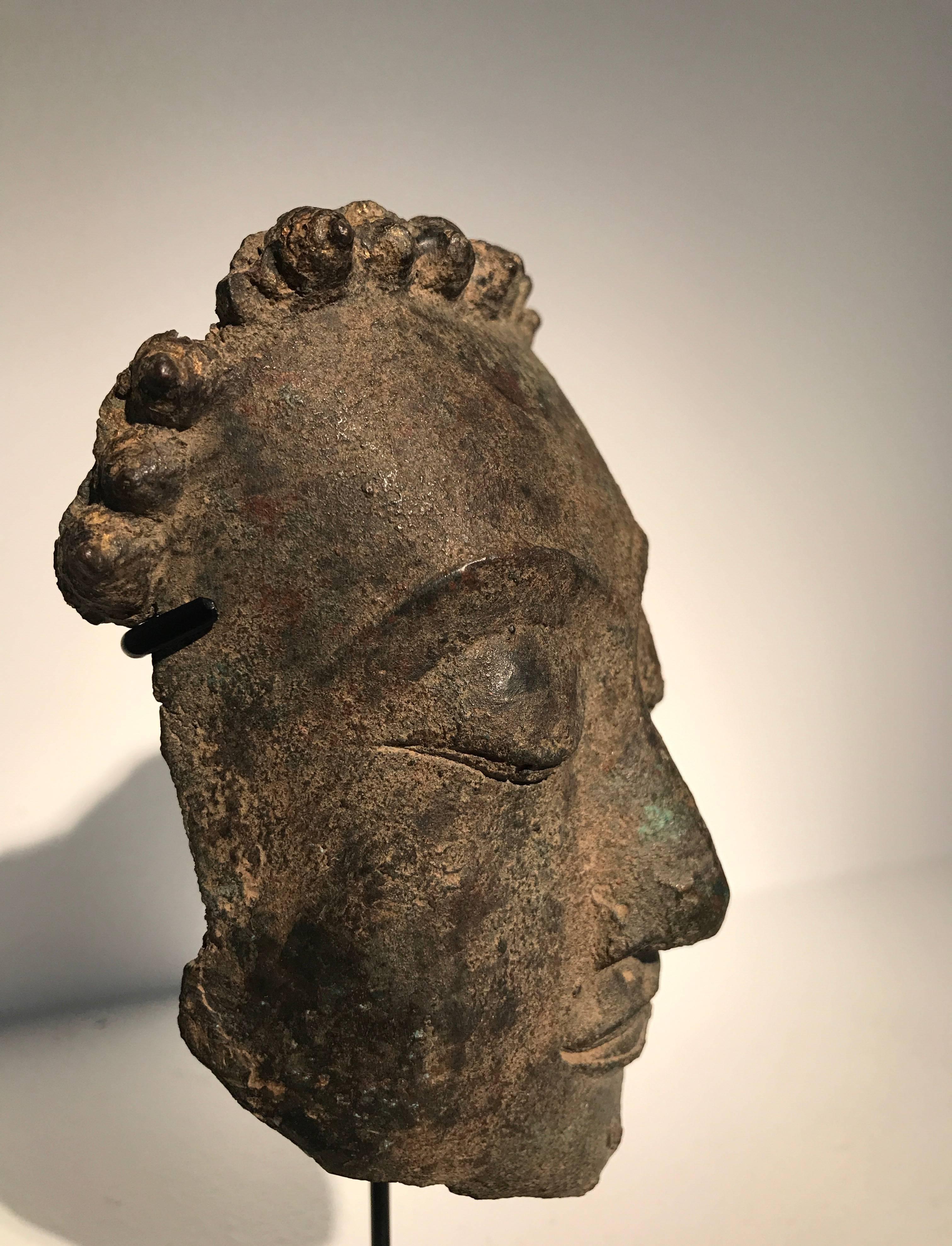 Fragment of Bronze Head of Buddha
Thailand
16th Century