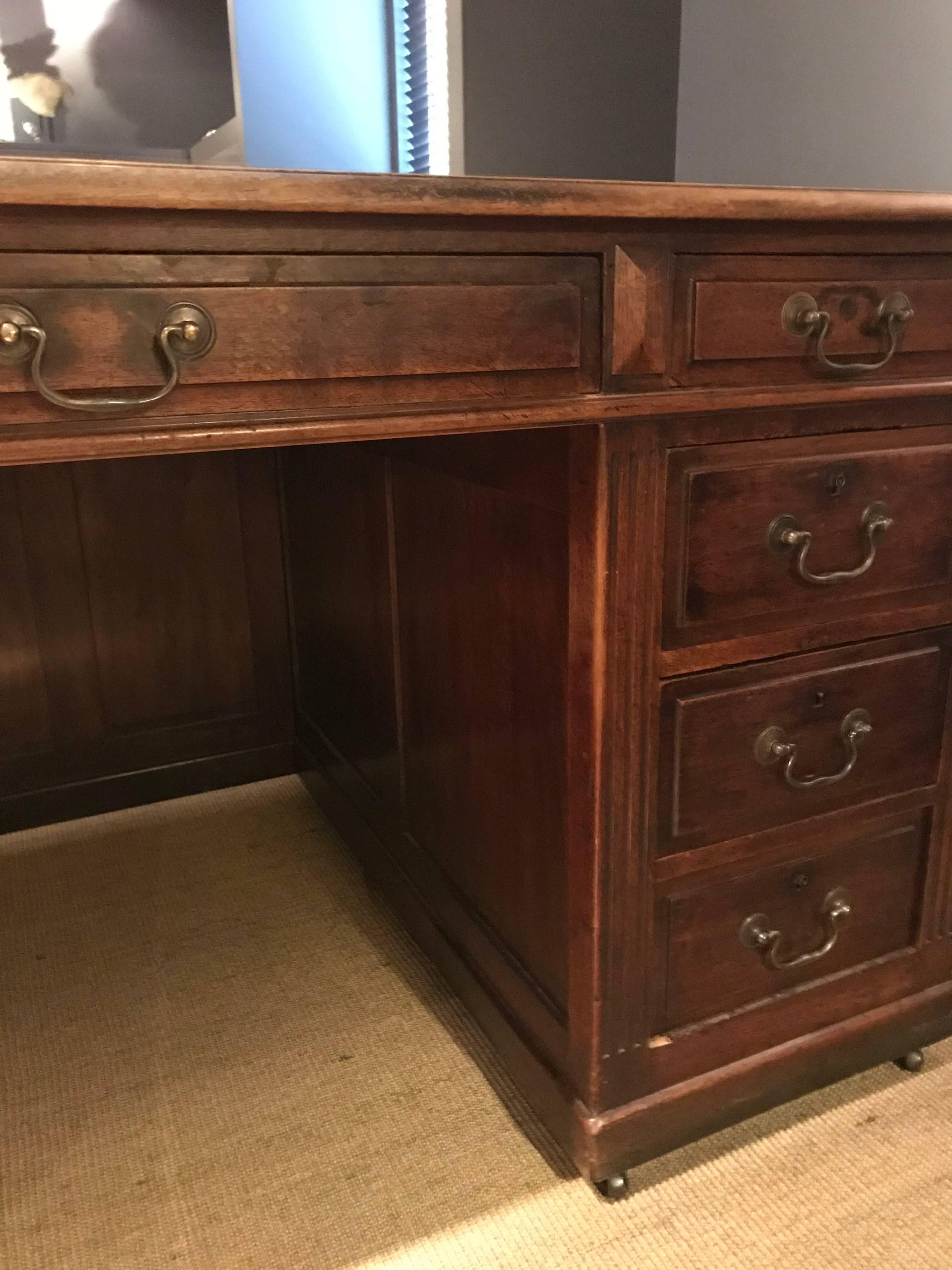 English Mahogany Writing Desk Bureau with nice old patina
9 drawers